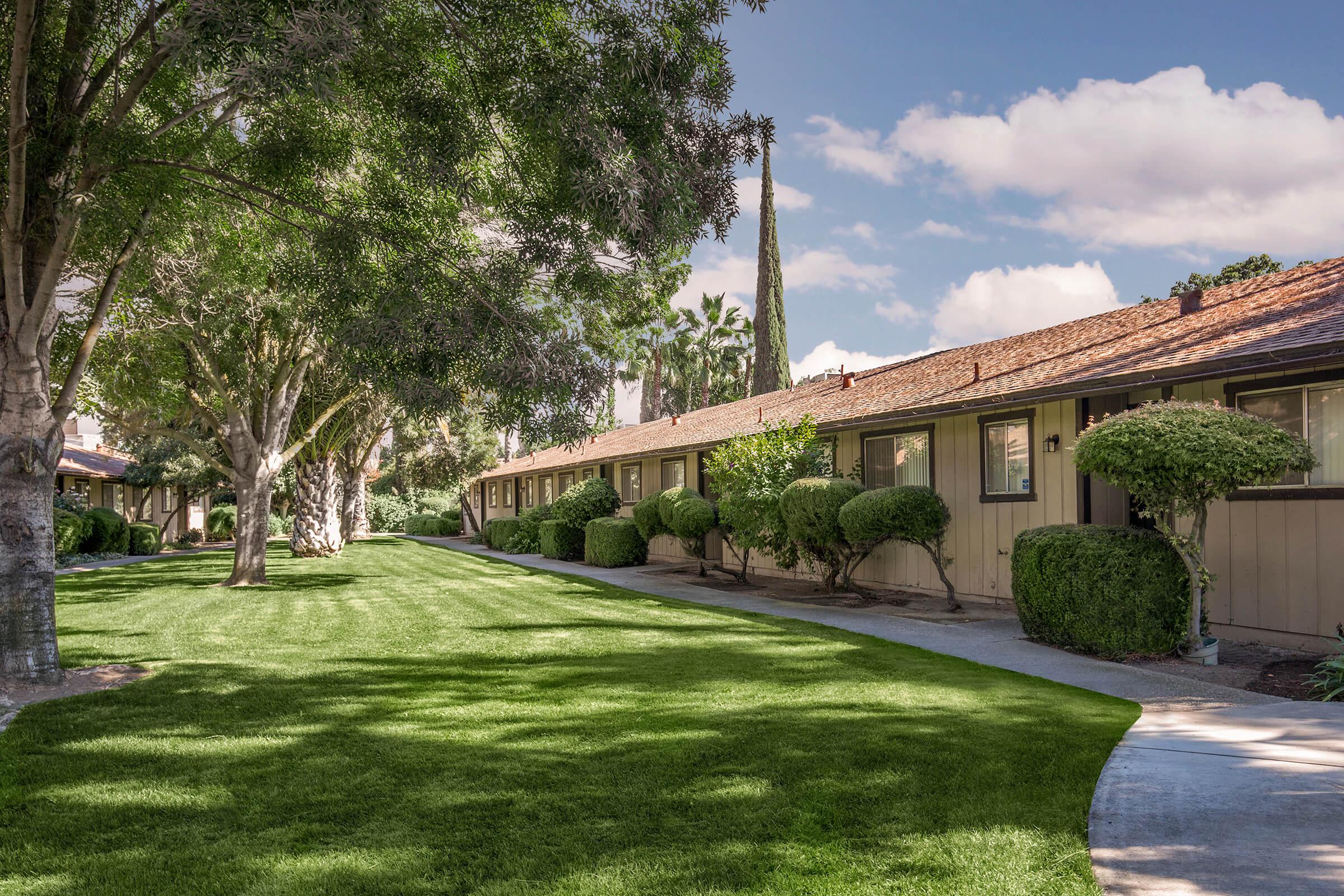 a large lawn in front of a house