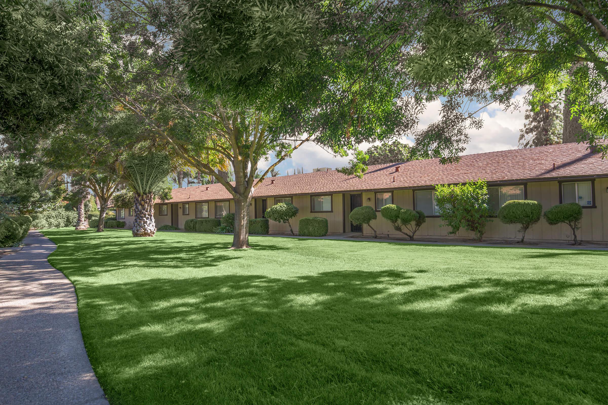 a large lawn in front of a house