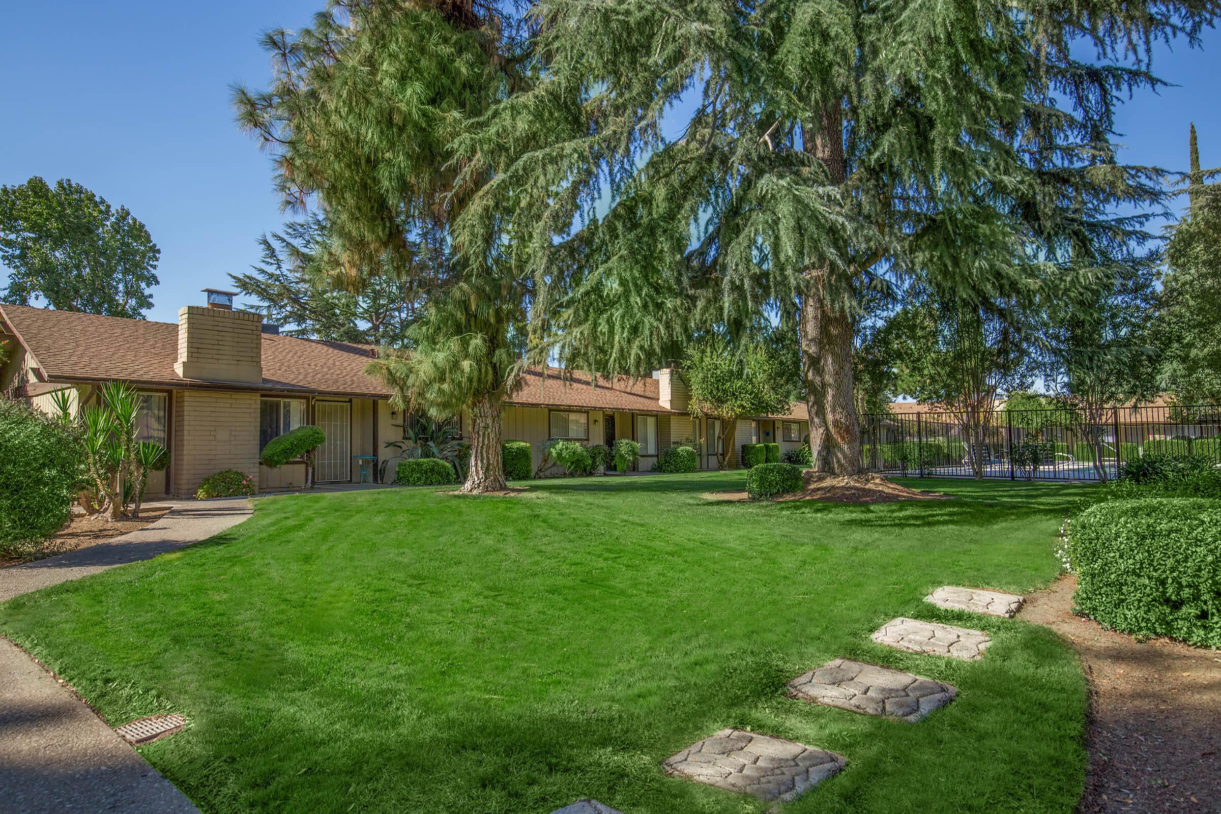 a large lawn in front of a house
