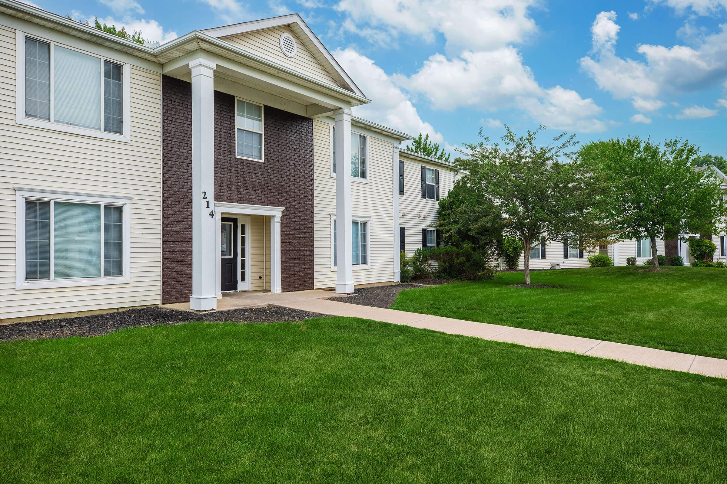 a large lawn in front of a house