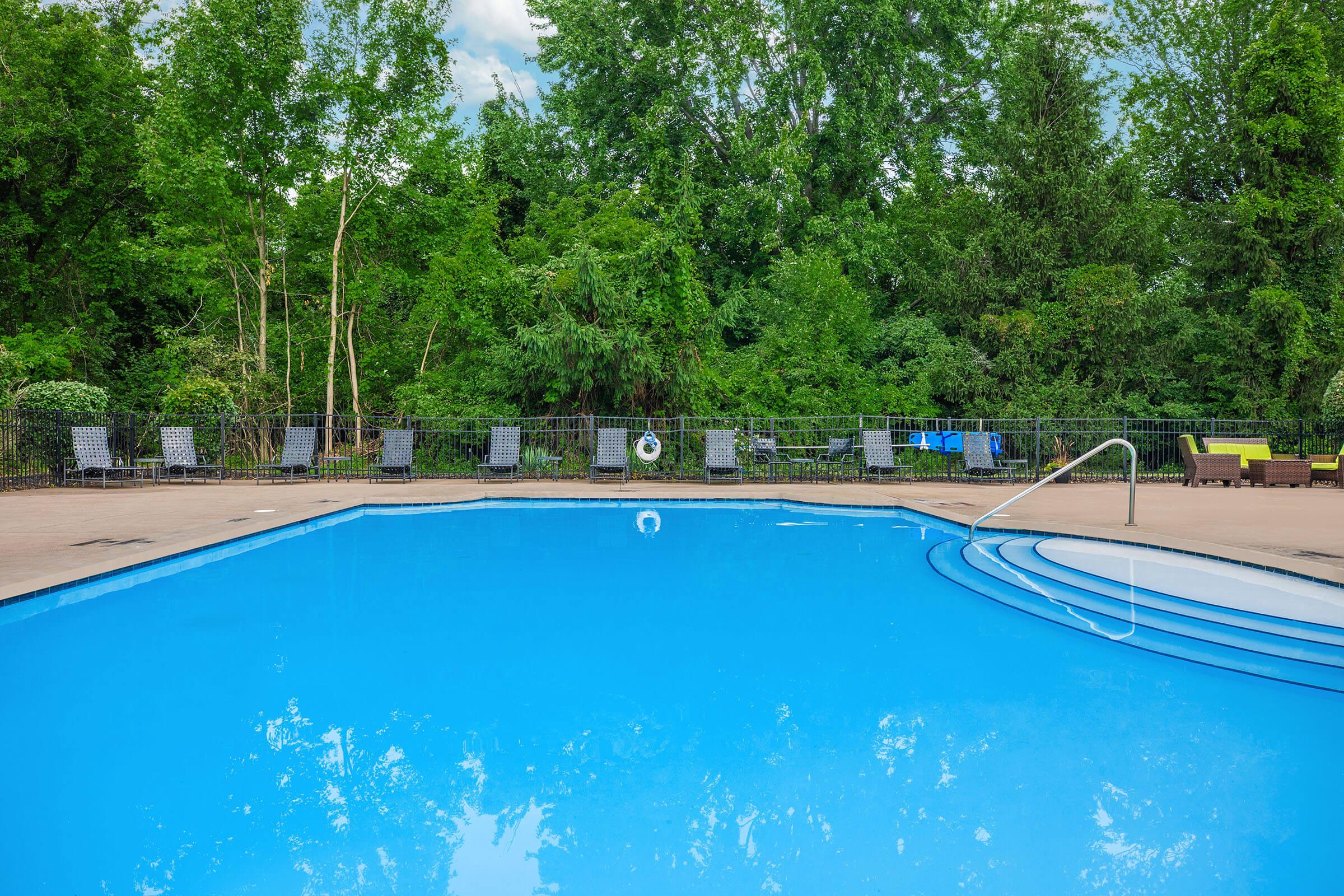 a pool next to a body of water