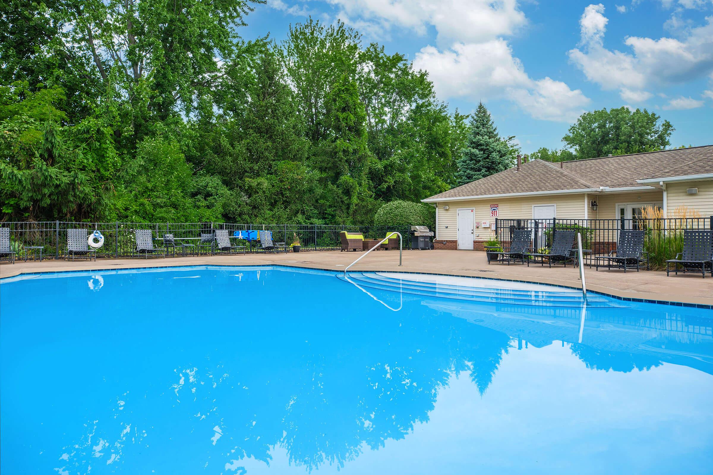 a pool next to a body of water