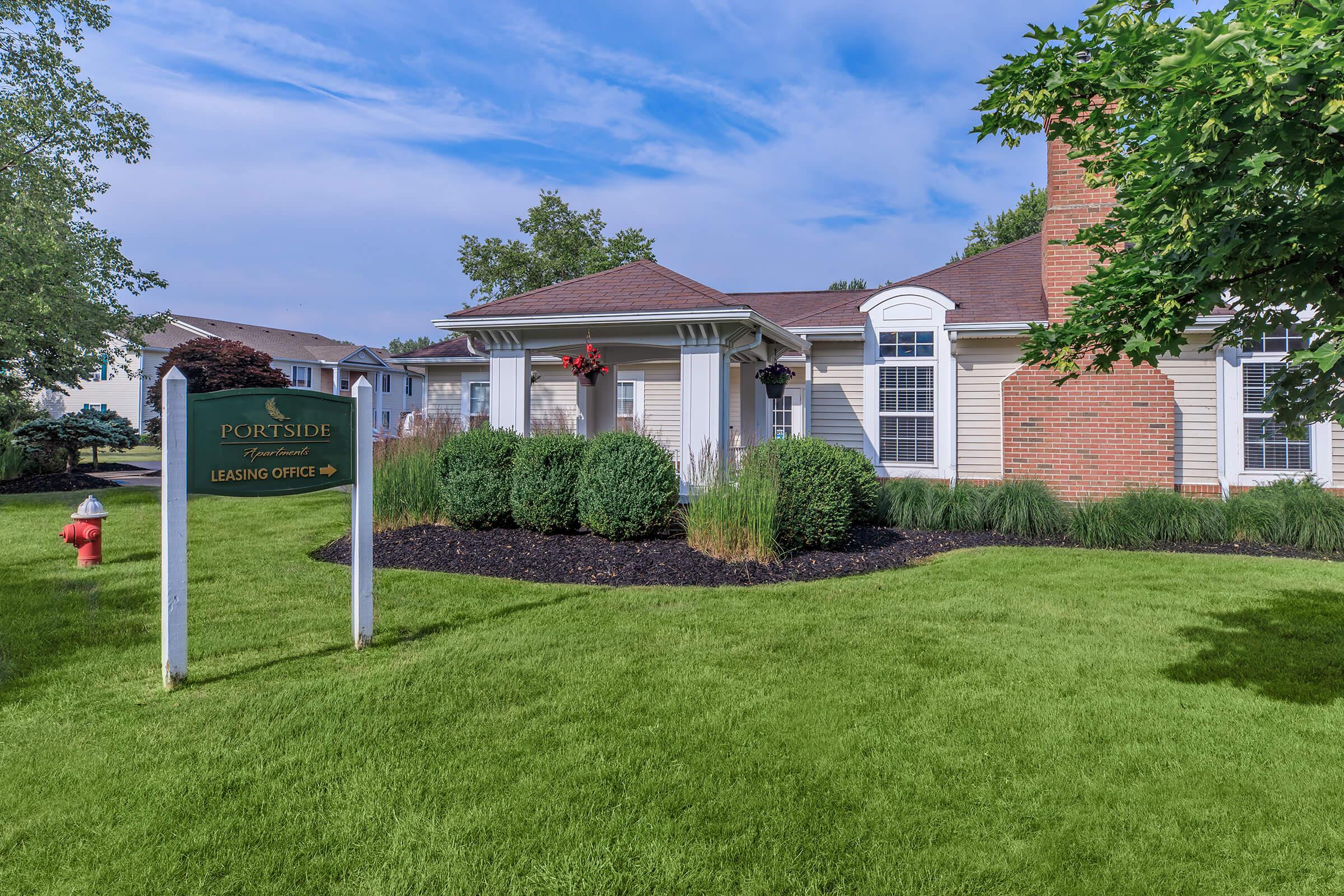 a large lawn in front of a house