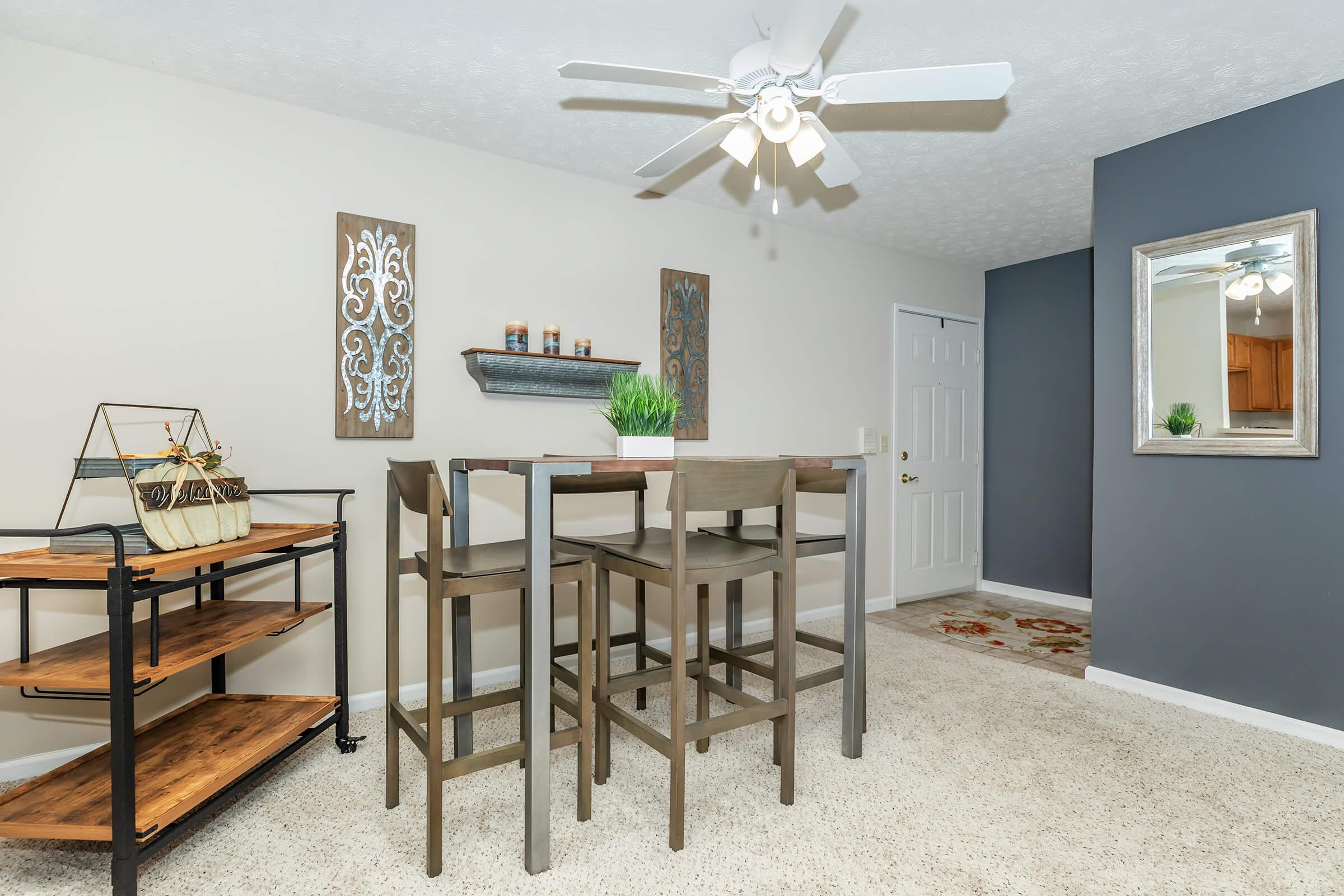 a room filled with furniture and a table