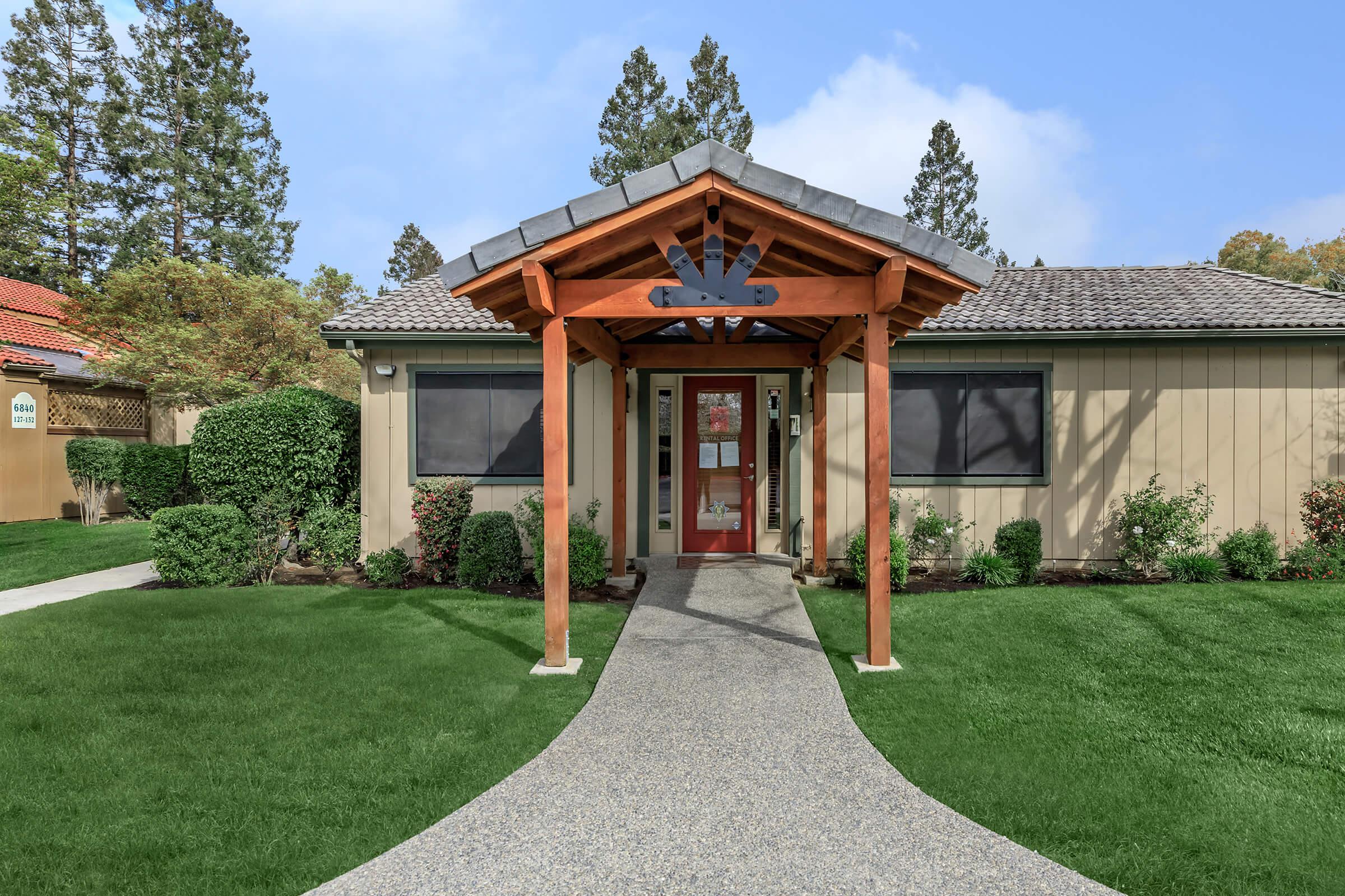 a large lawn in front of a house