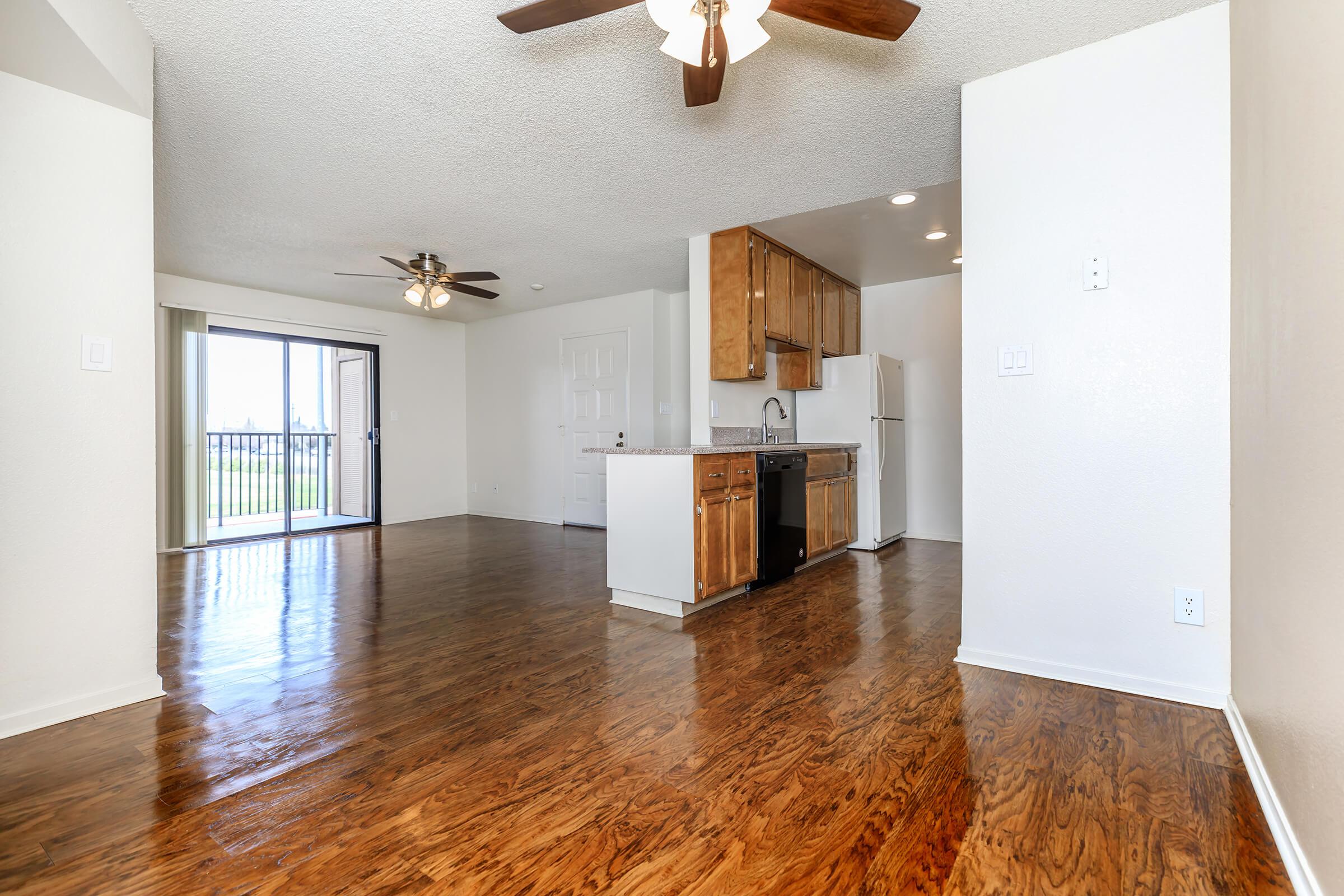 a kitchen with a wood floor