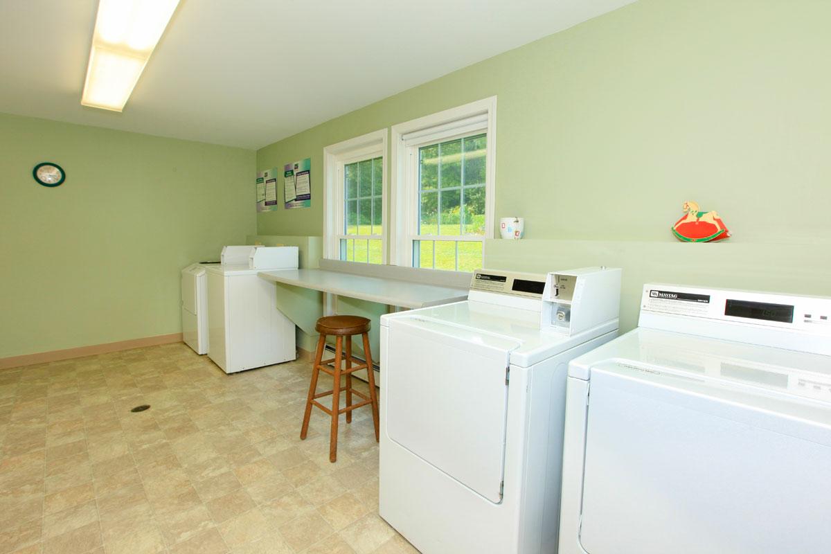 a white refrigerator freezer sitting in a room