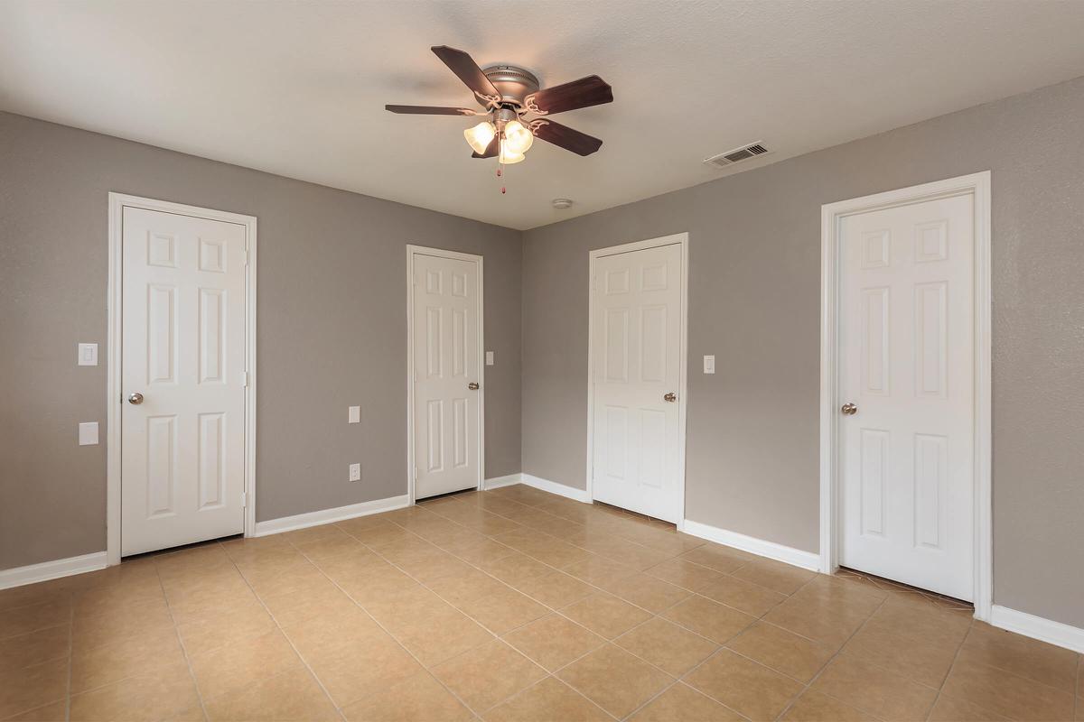 a kitchen with a wooden floor