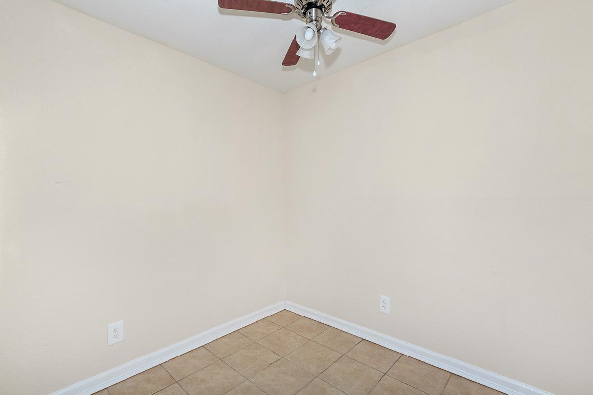 a white sink in a small room