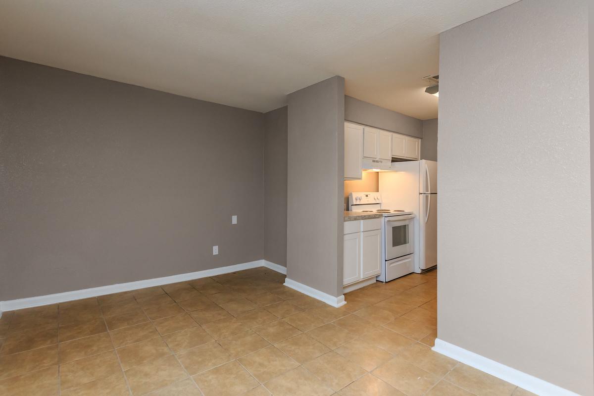 a large white refrigerator in a kitchen