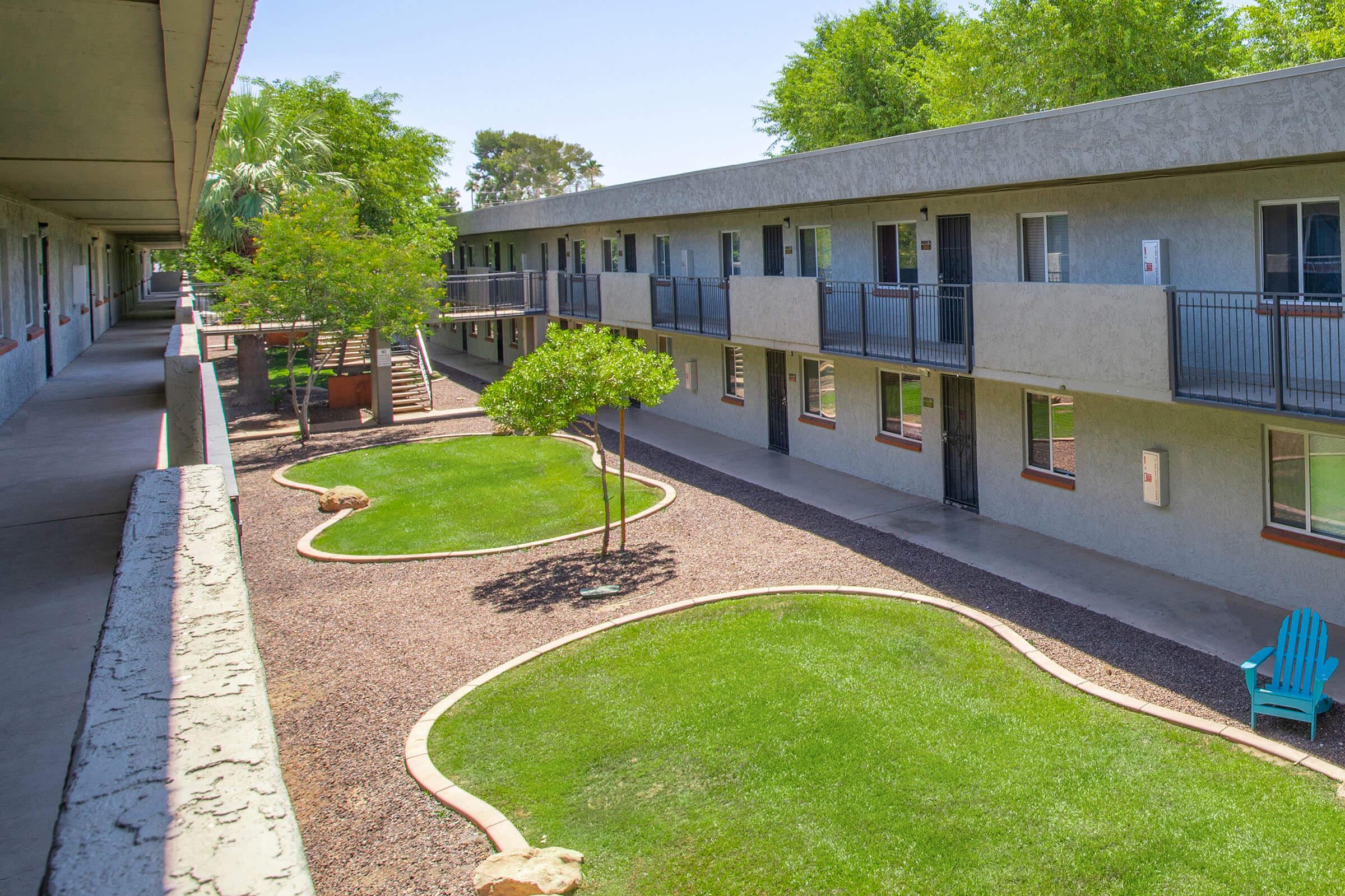 a large lawn in front of a building