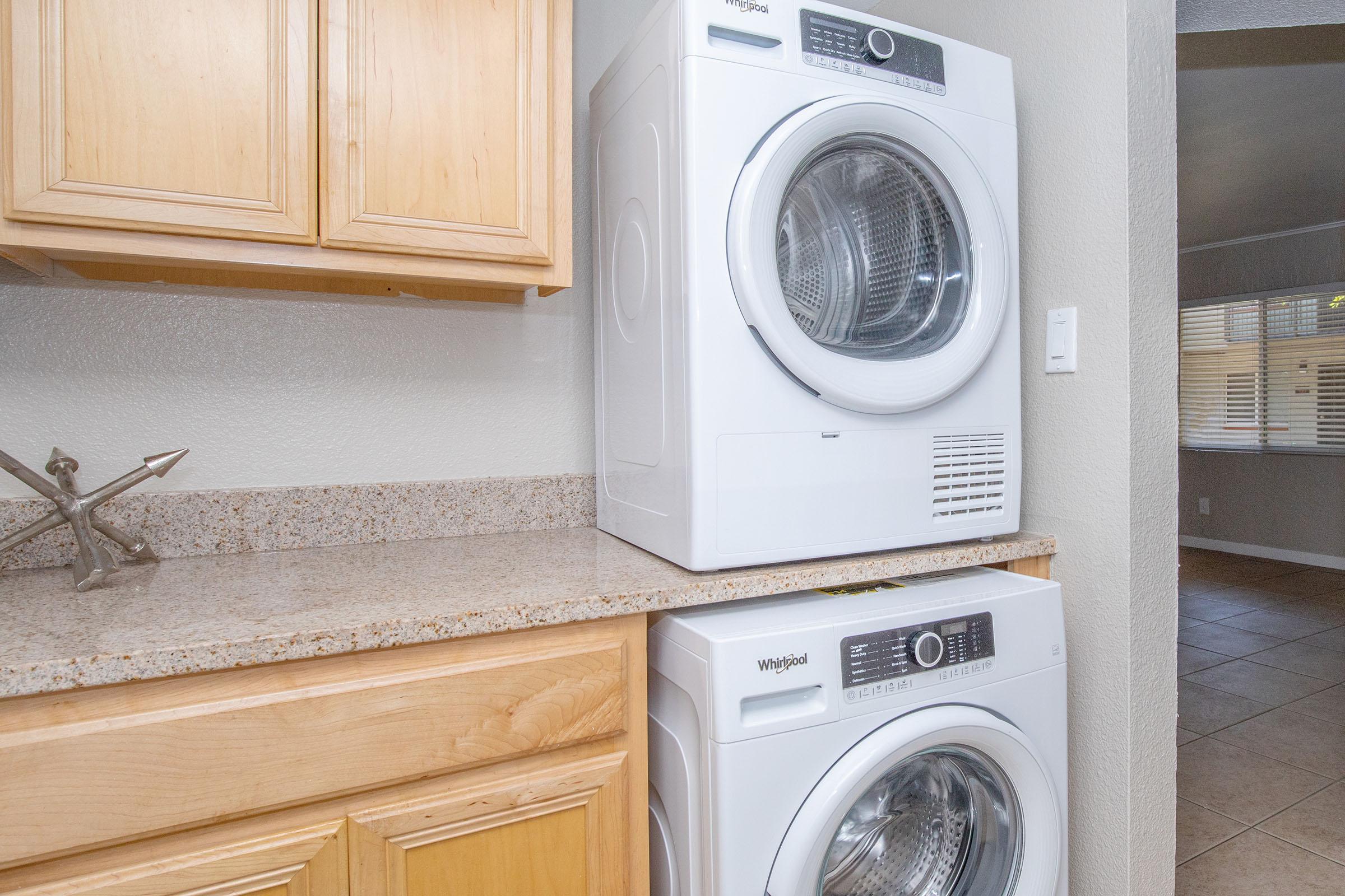 a microwave oven sitting on top of a stove