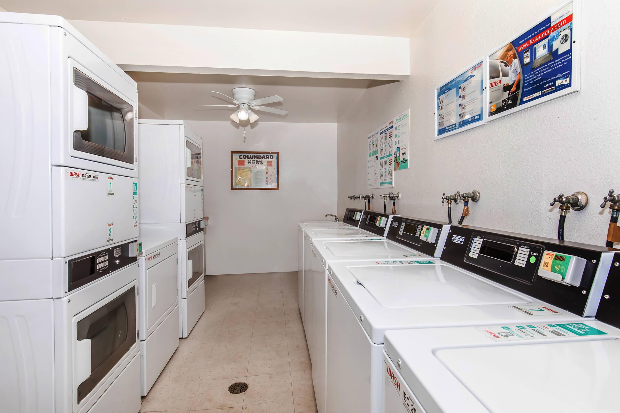 a stove top oven sitting inside of a kitchen