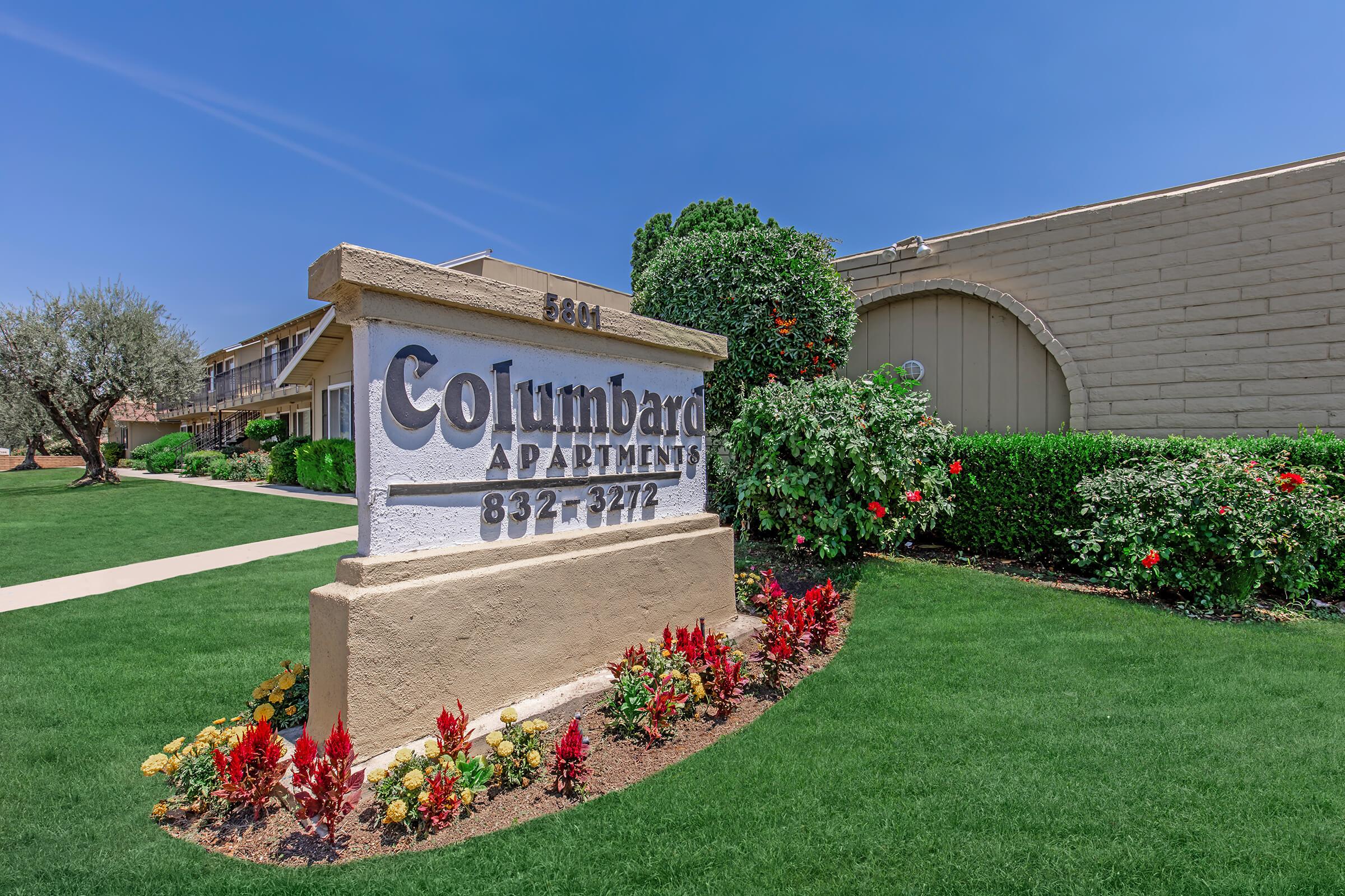 a large lawn in front of a building