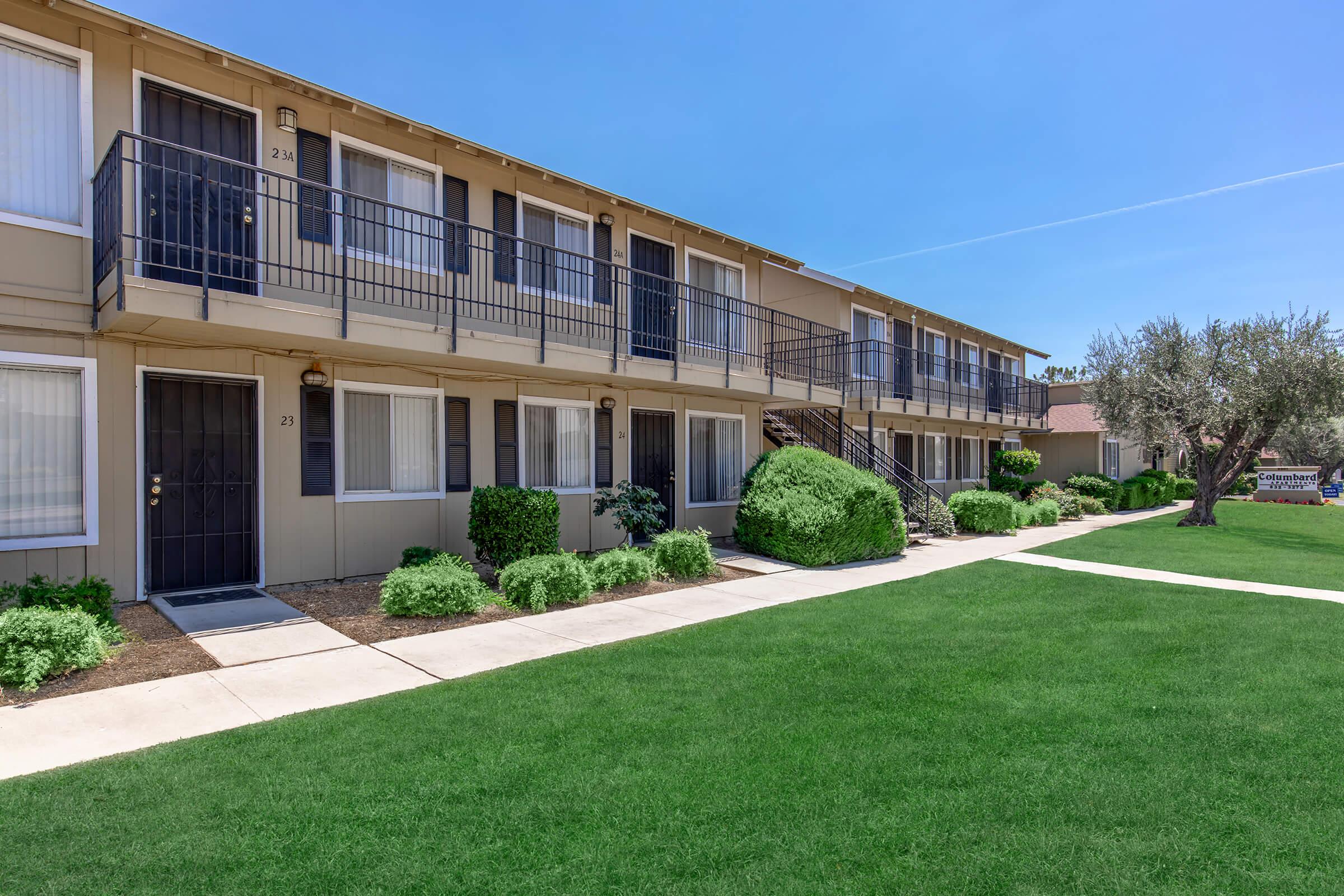 a large lawn in front of a building