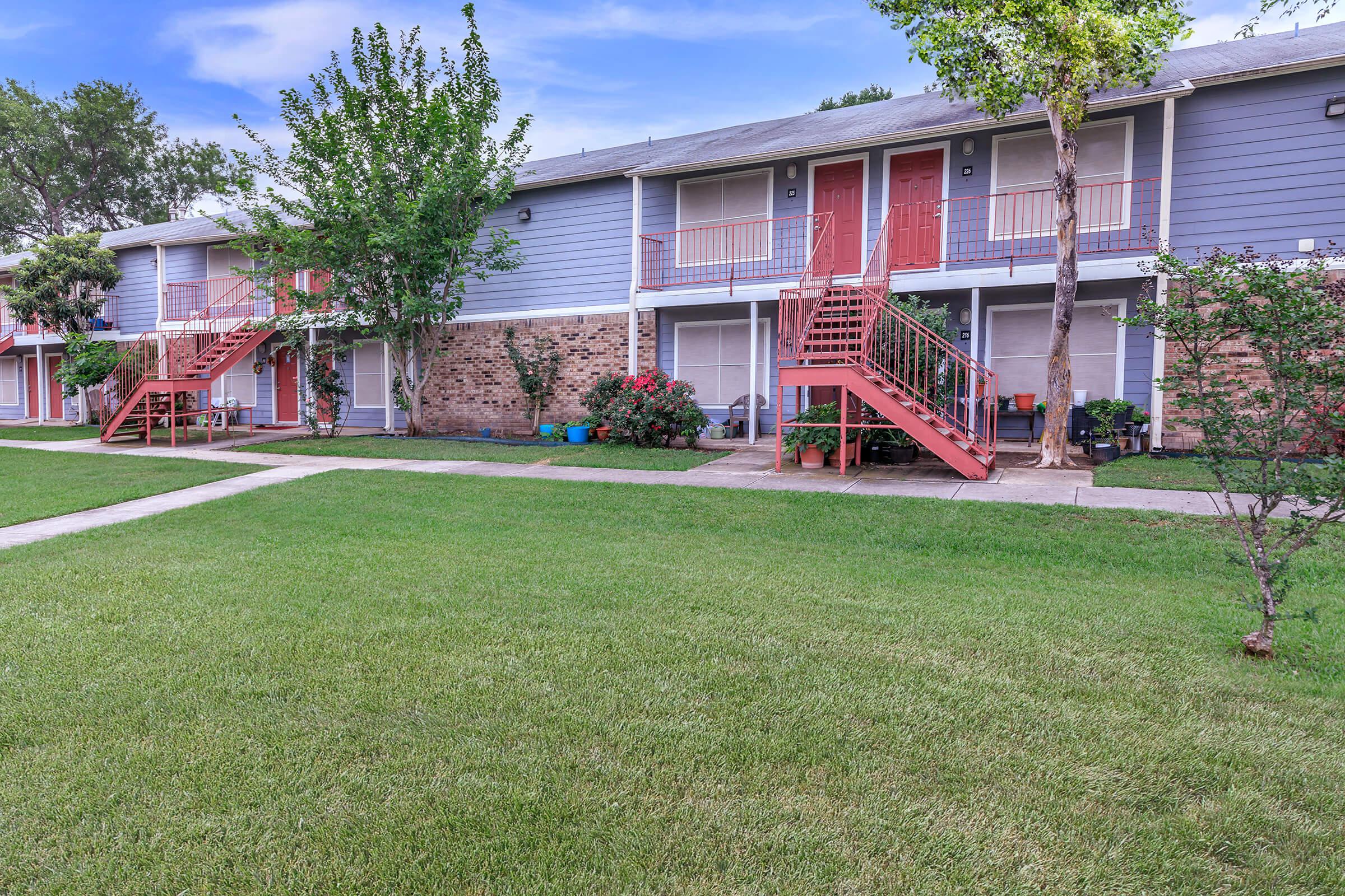 a large lawn in front of a house