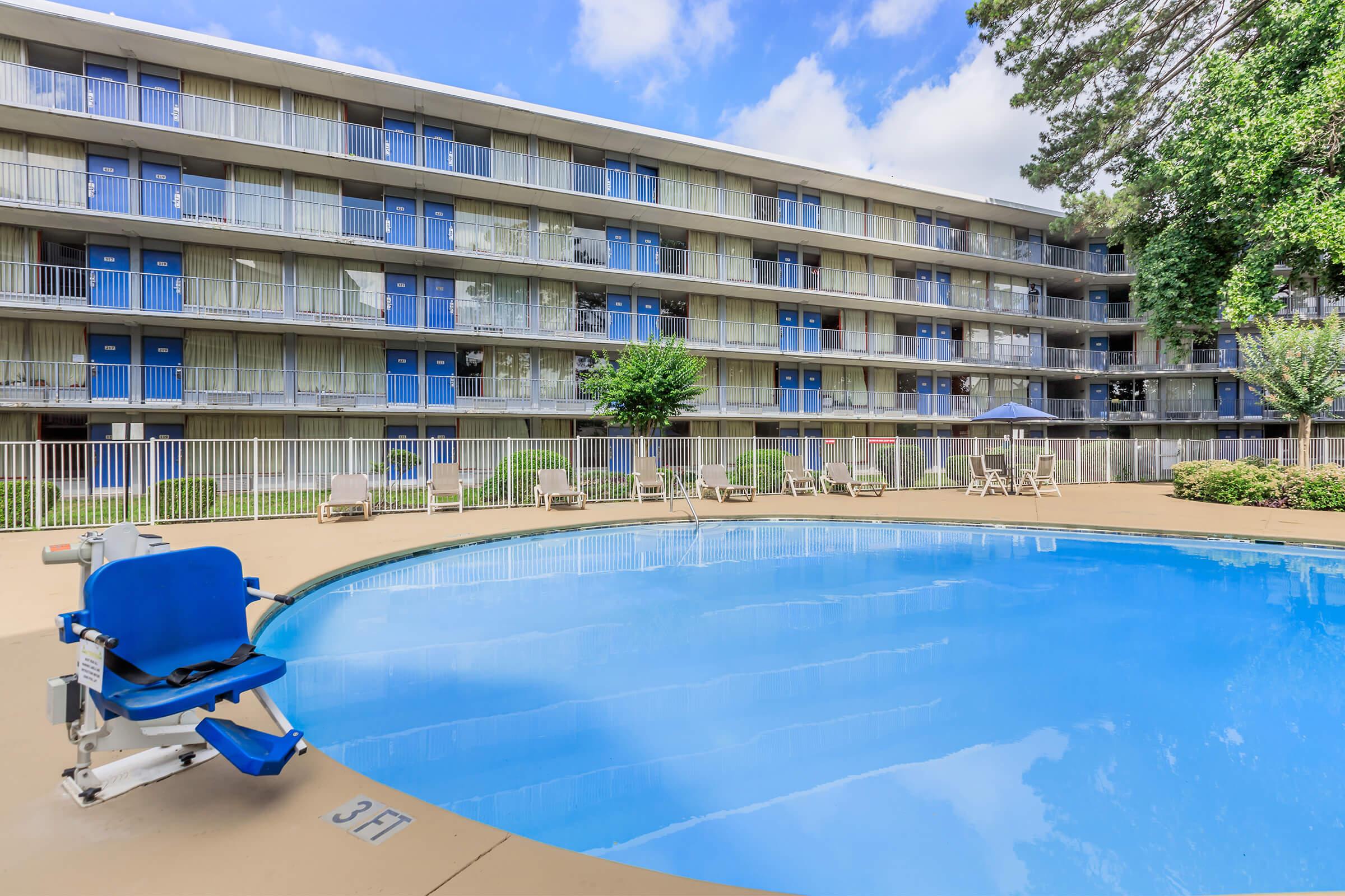 a large pool of water in front of a building