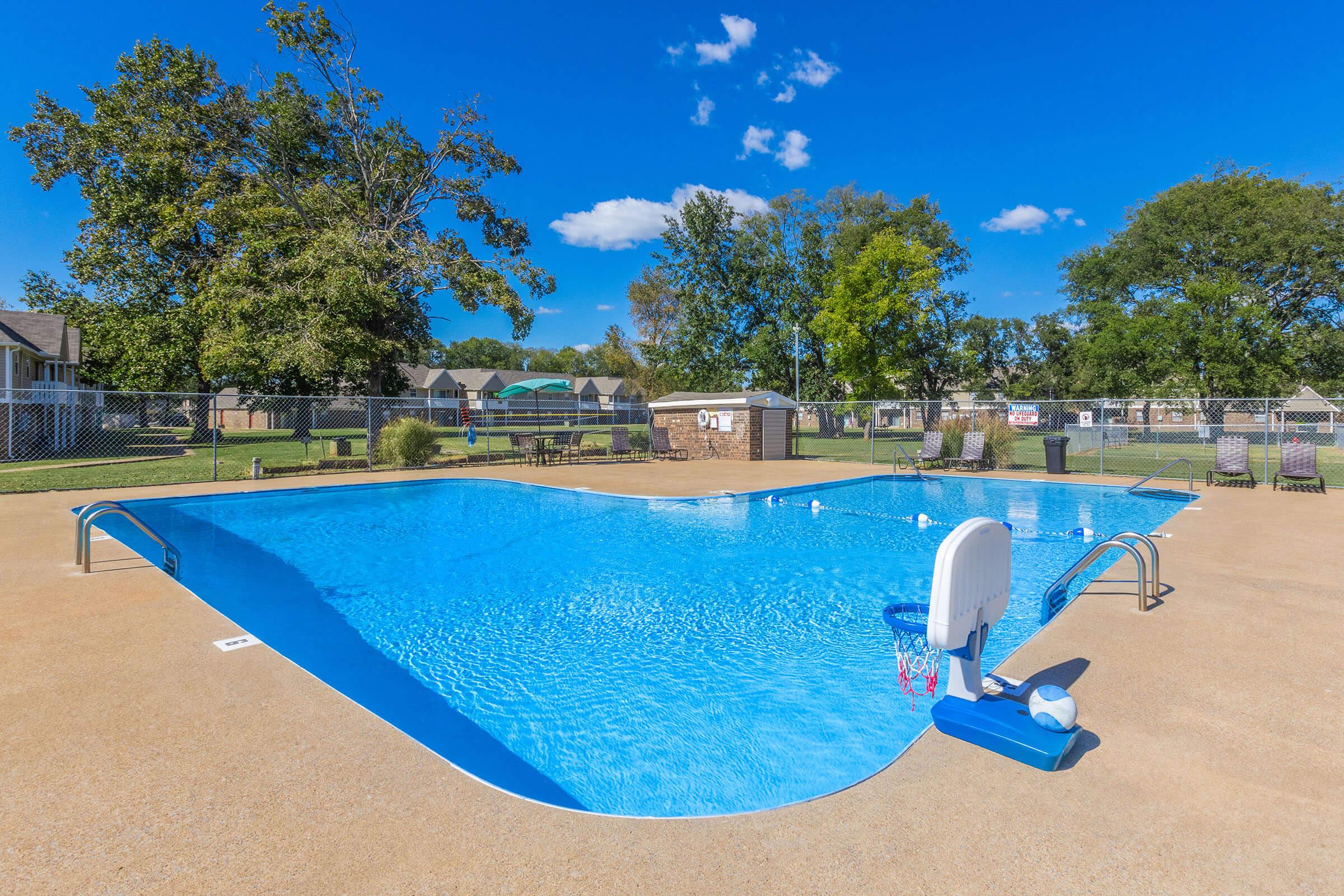 a pool next to a body of water