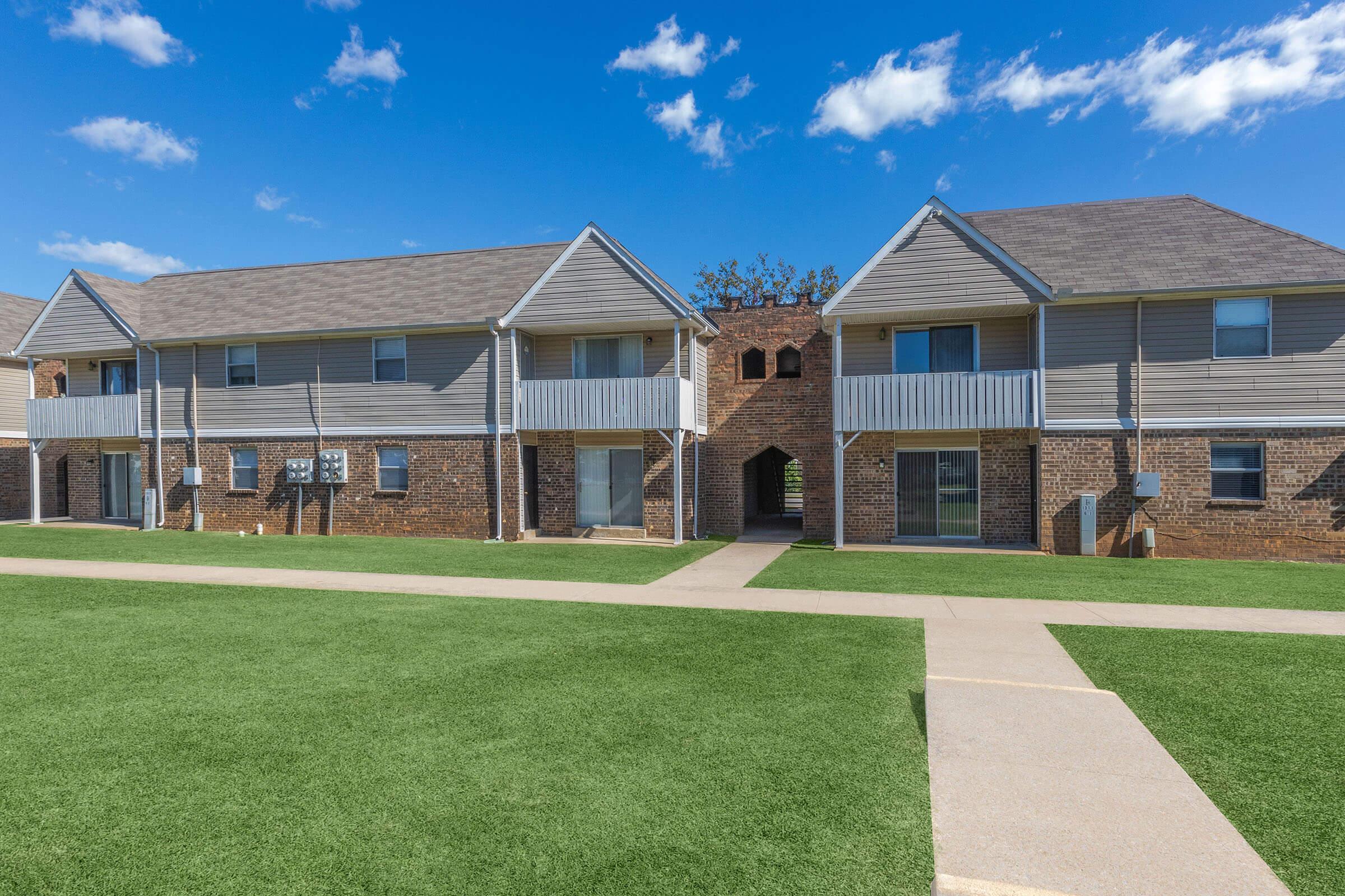 a large lawn in front of a house