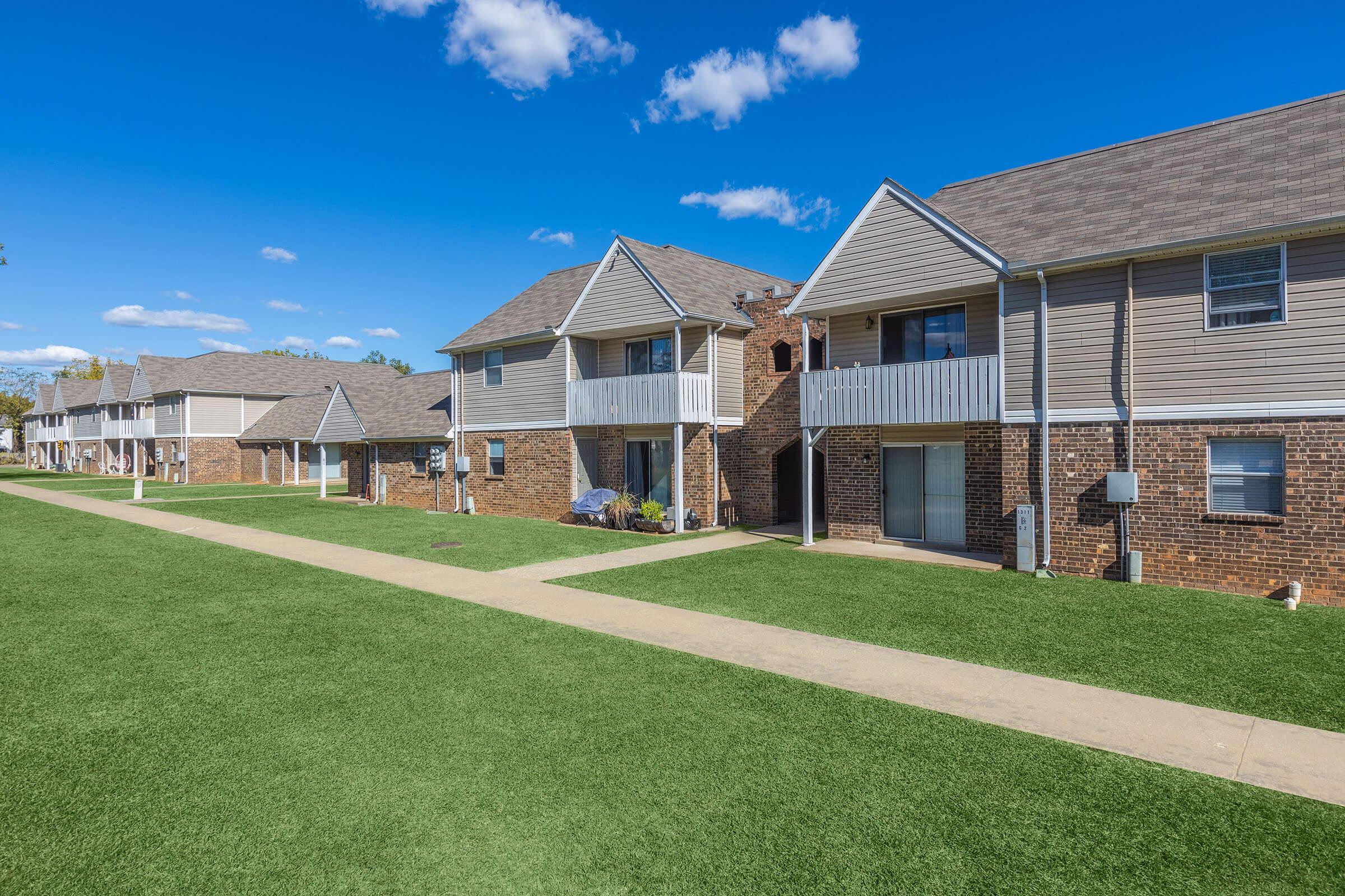 a large lawn in front of a house