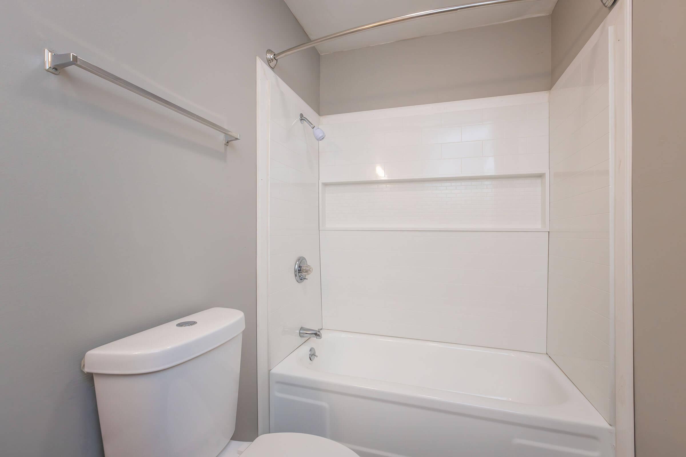 a close up of a shower in a small room