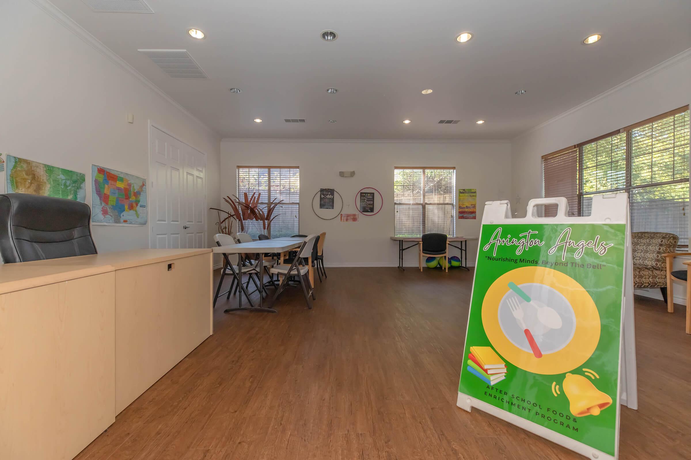 a kitchen with a wooden floor