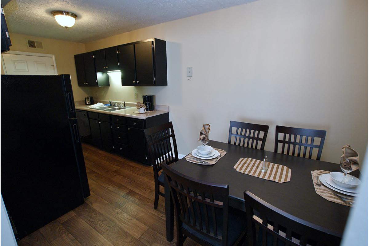 then dining area and kitchen at Green Meadow apartments