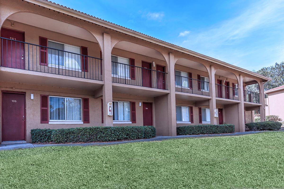 a large lawn in front of a building