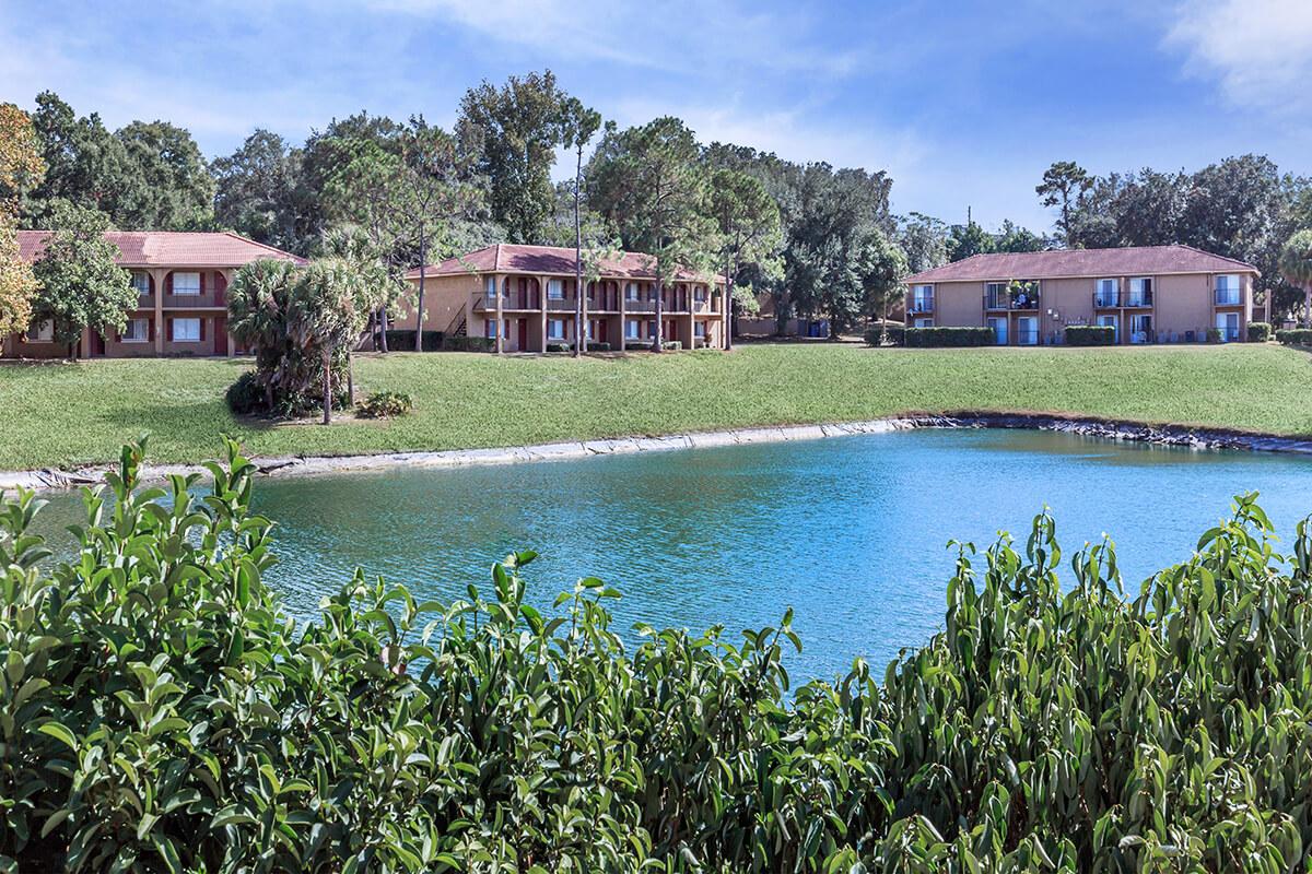 a body of water in front of a house