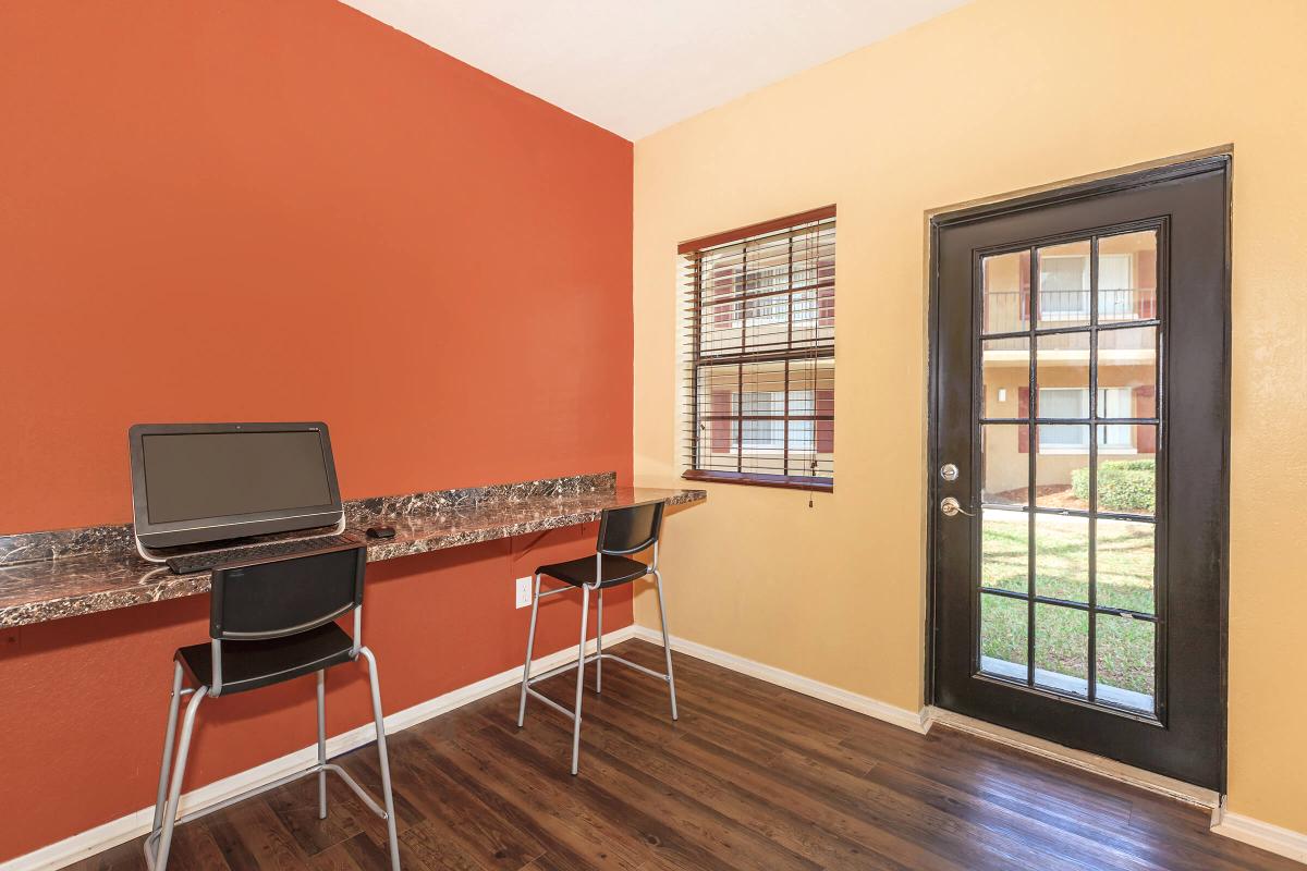 a room filled with furniture and a window