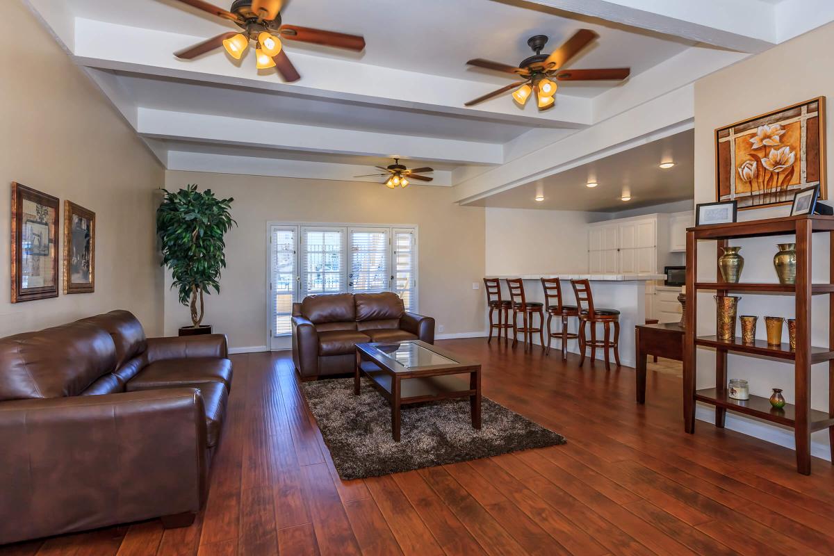 a living room filled with furniture and a fireplace