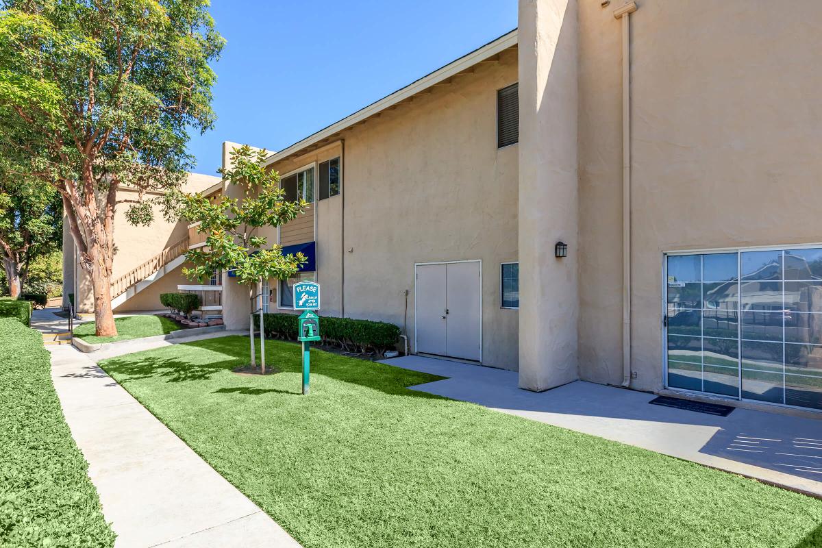 a large lawn in front of a building