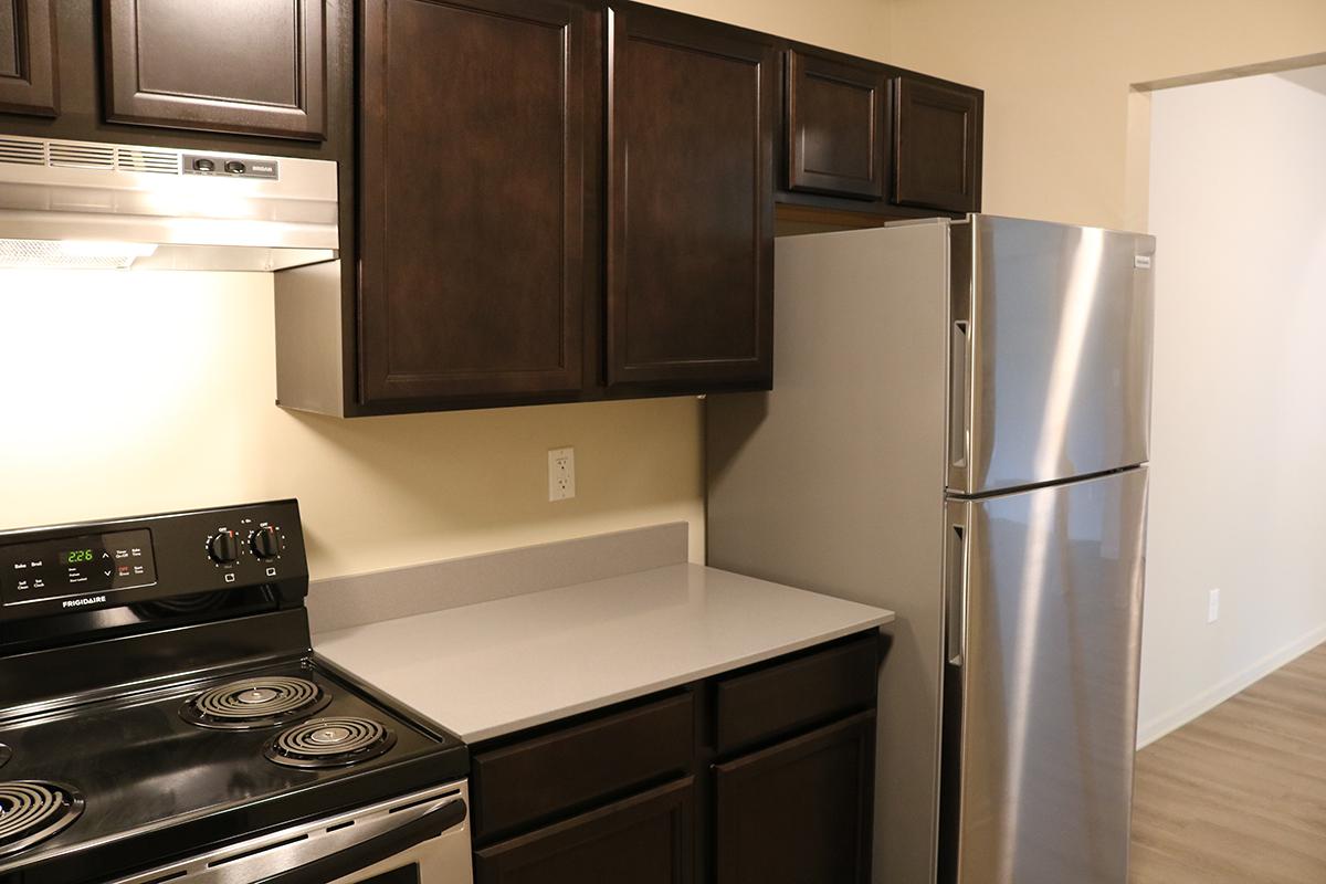 a stainless steel refrigerator in a kitchen