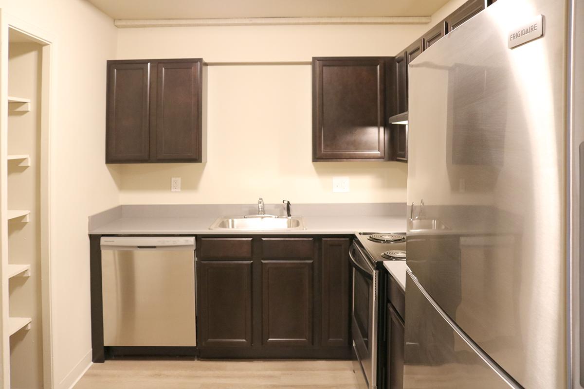 a stainless steel refrigerator in a kitchen