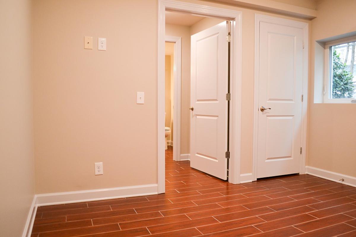 a kitchen with a white door
