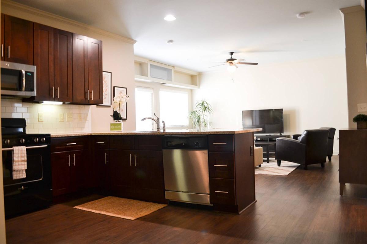 a large kitchen with stainless steel appliances