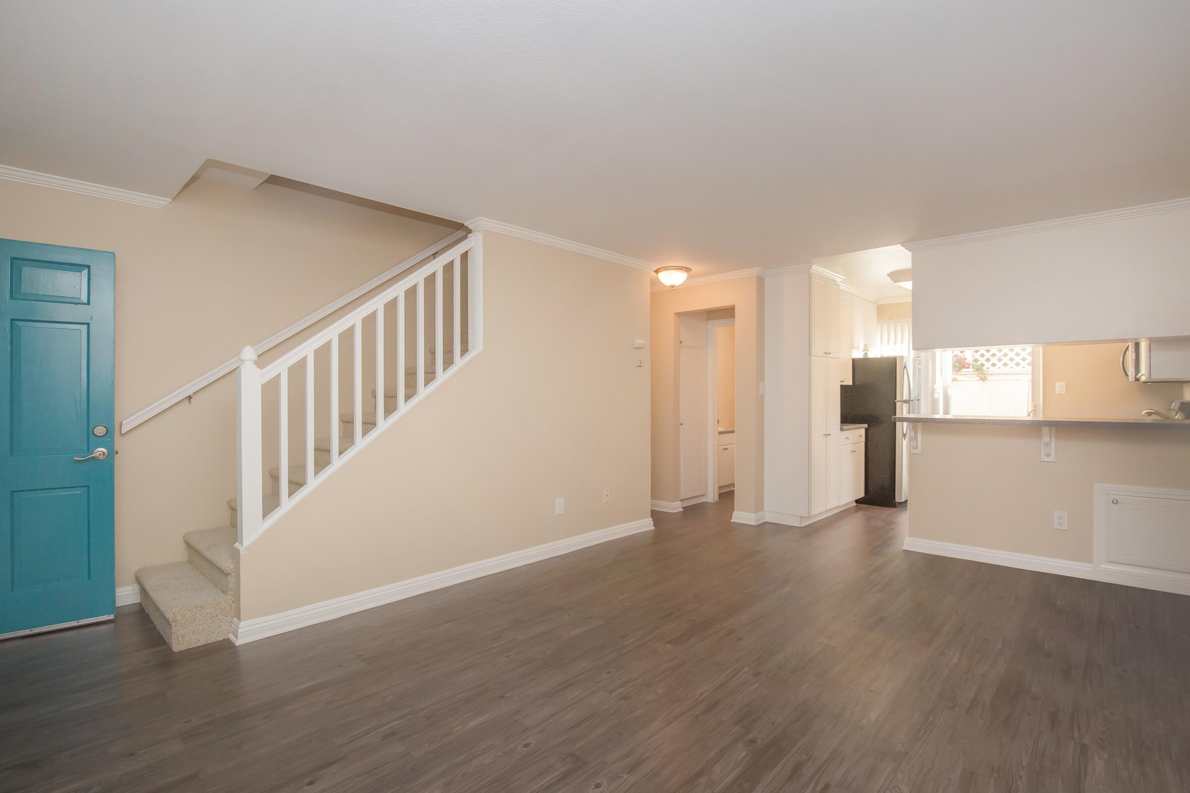 Vacant living room with stairs