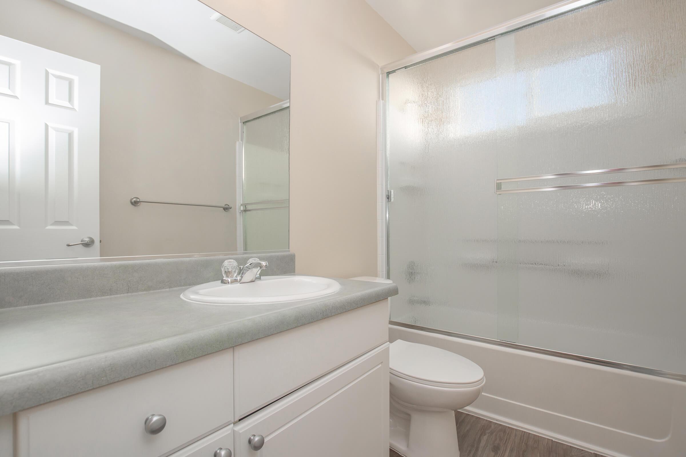 Bathroom with glass sliding doors