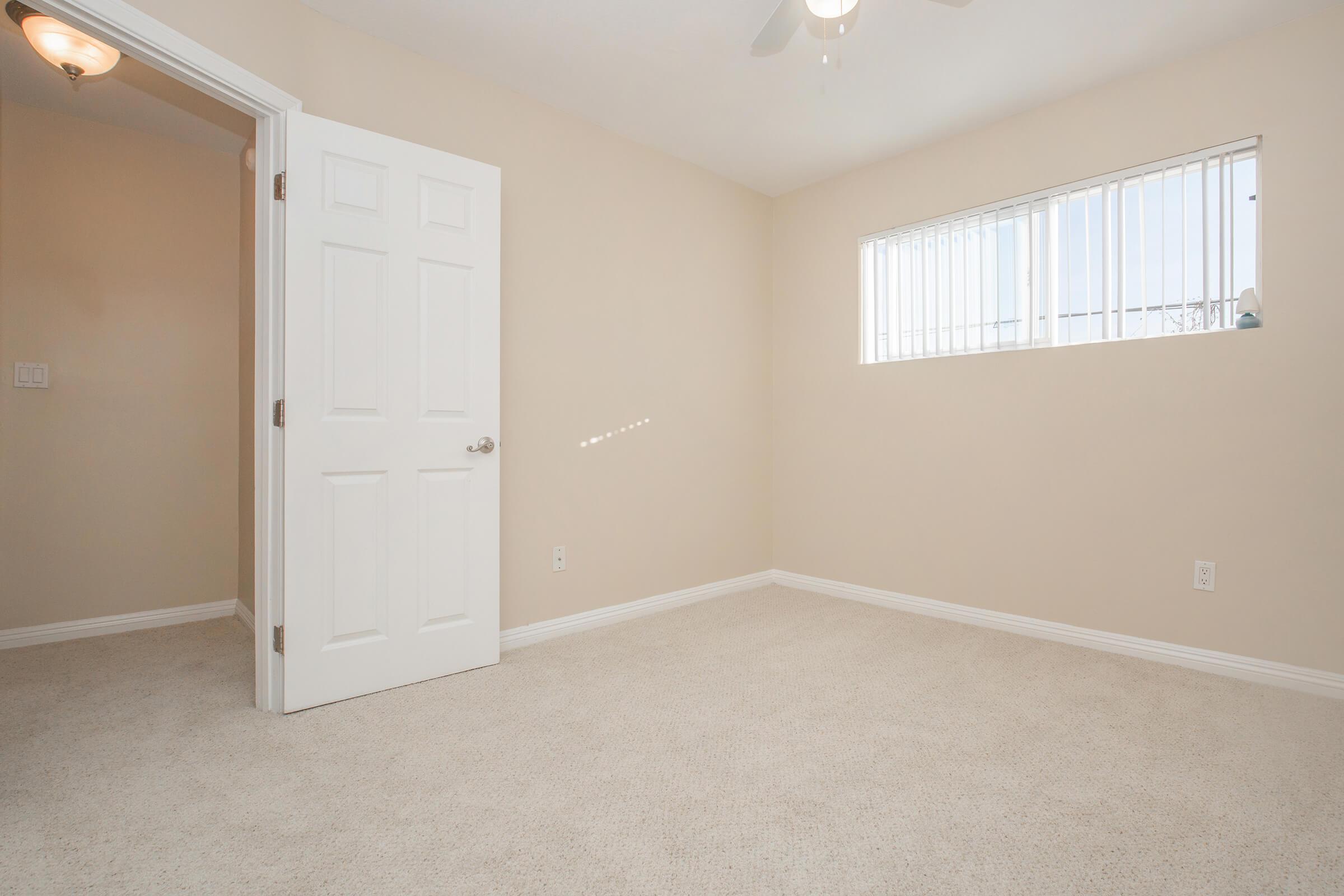 Bedroom with carpeting