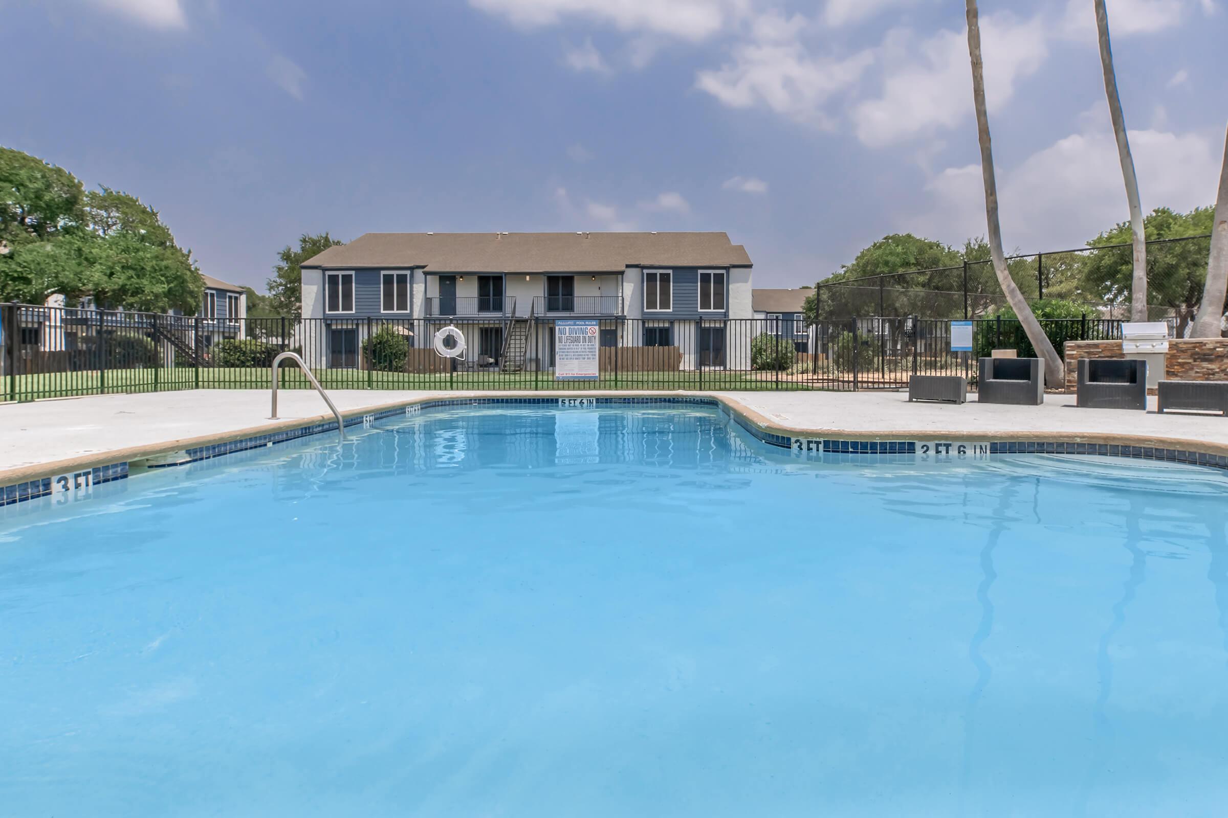 a pool next to a body of water