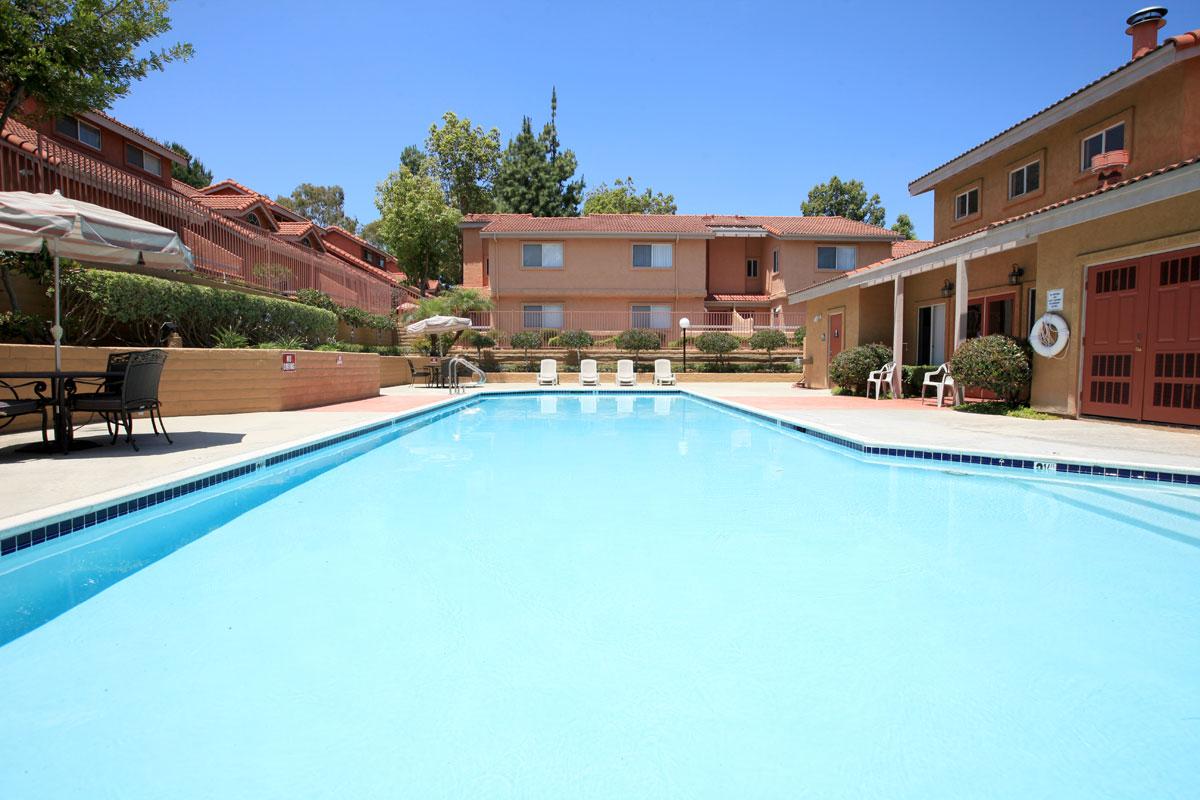 a pool next to a building