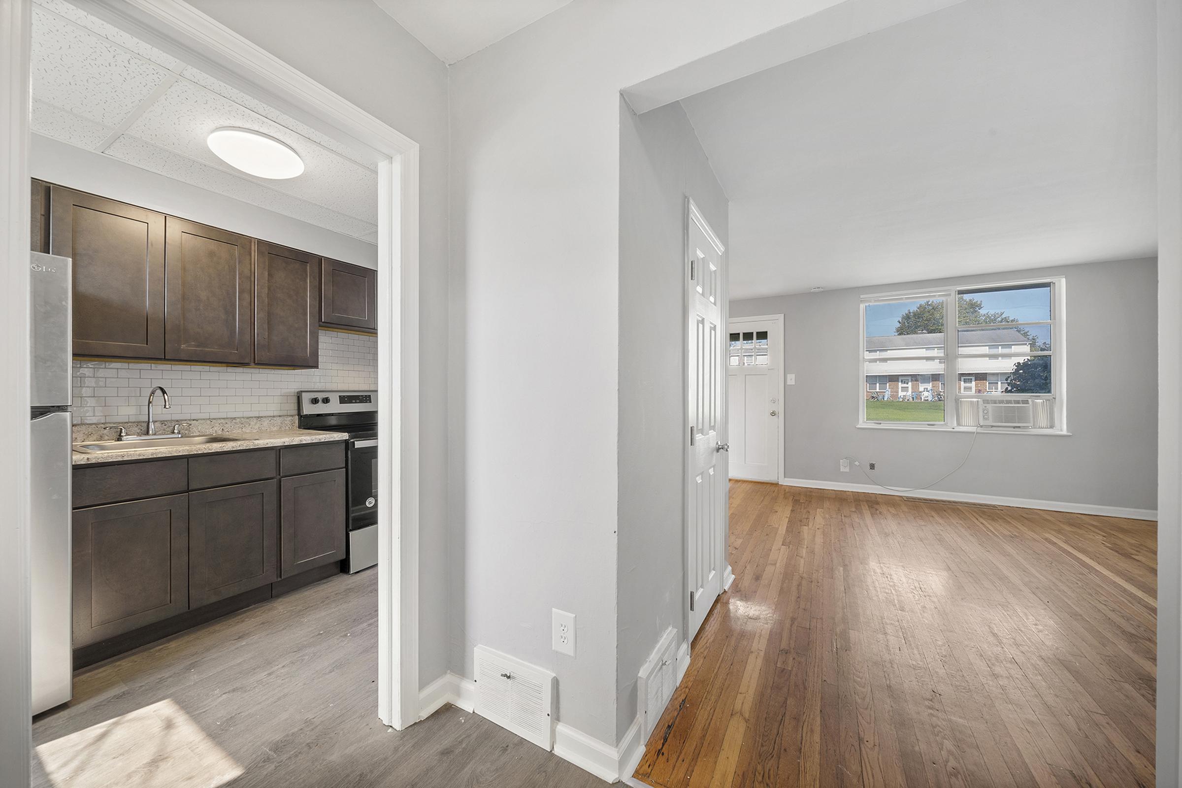 a kitchen with a sink and a window