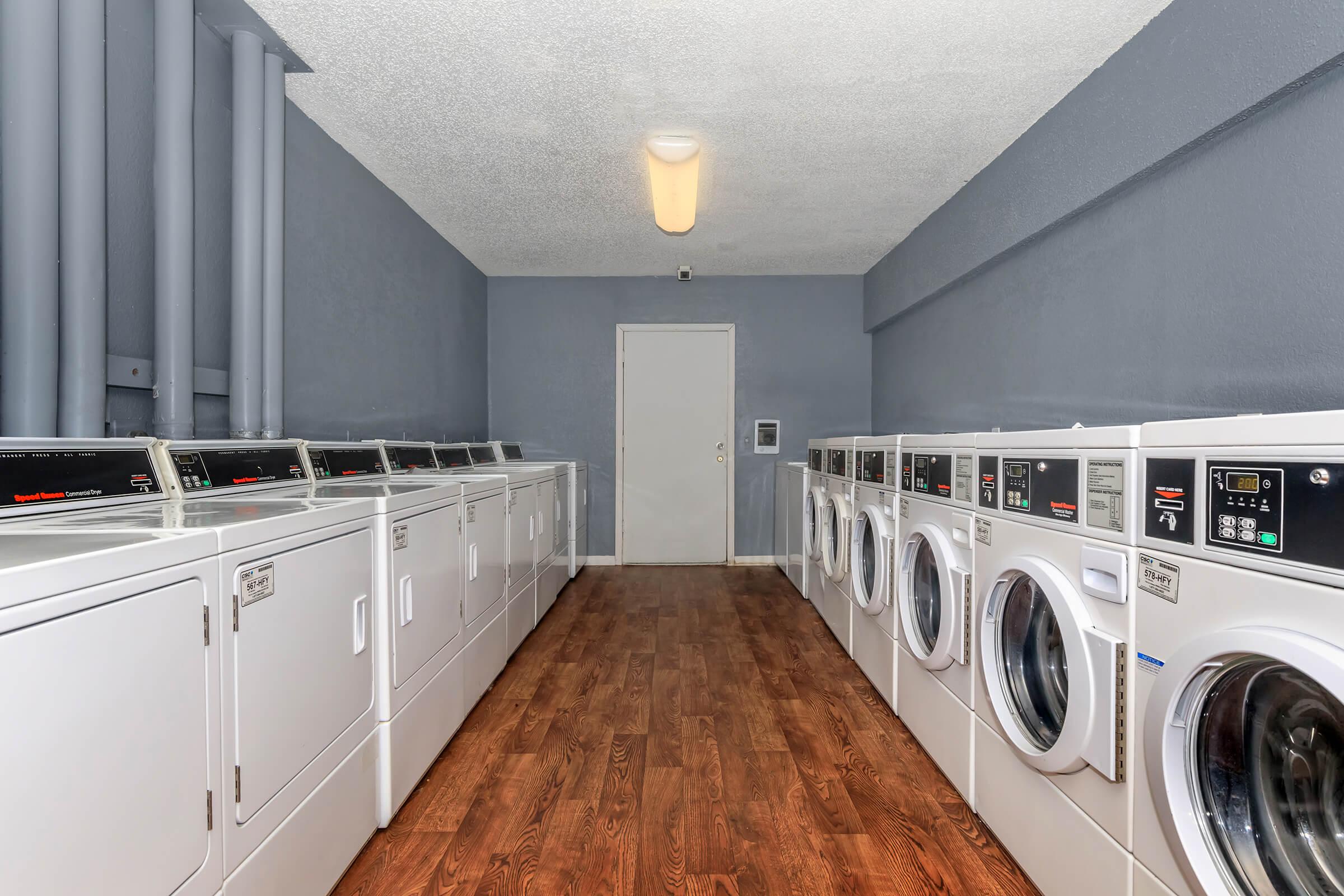 a kitchen with a sink and a microwave