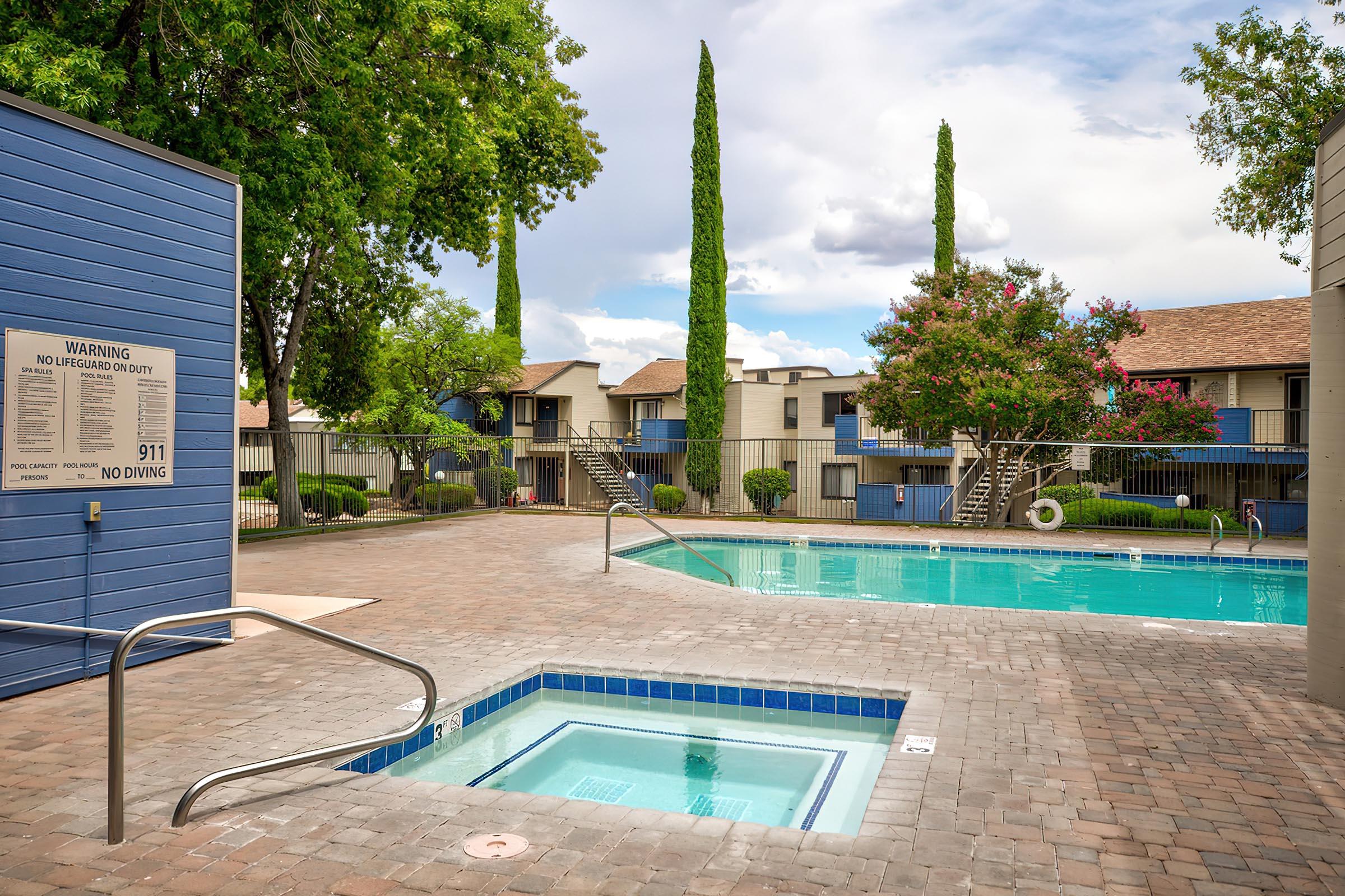 a pool in front of a building