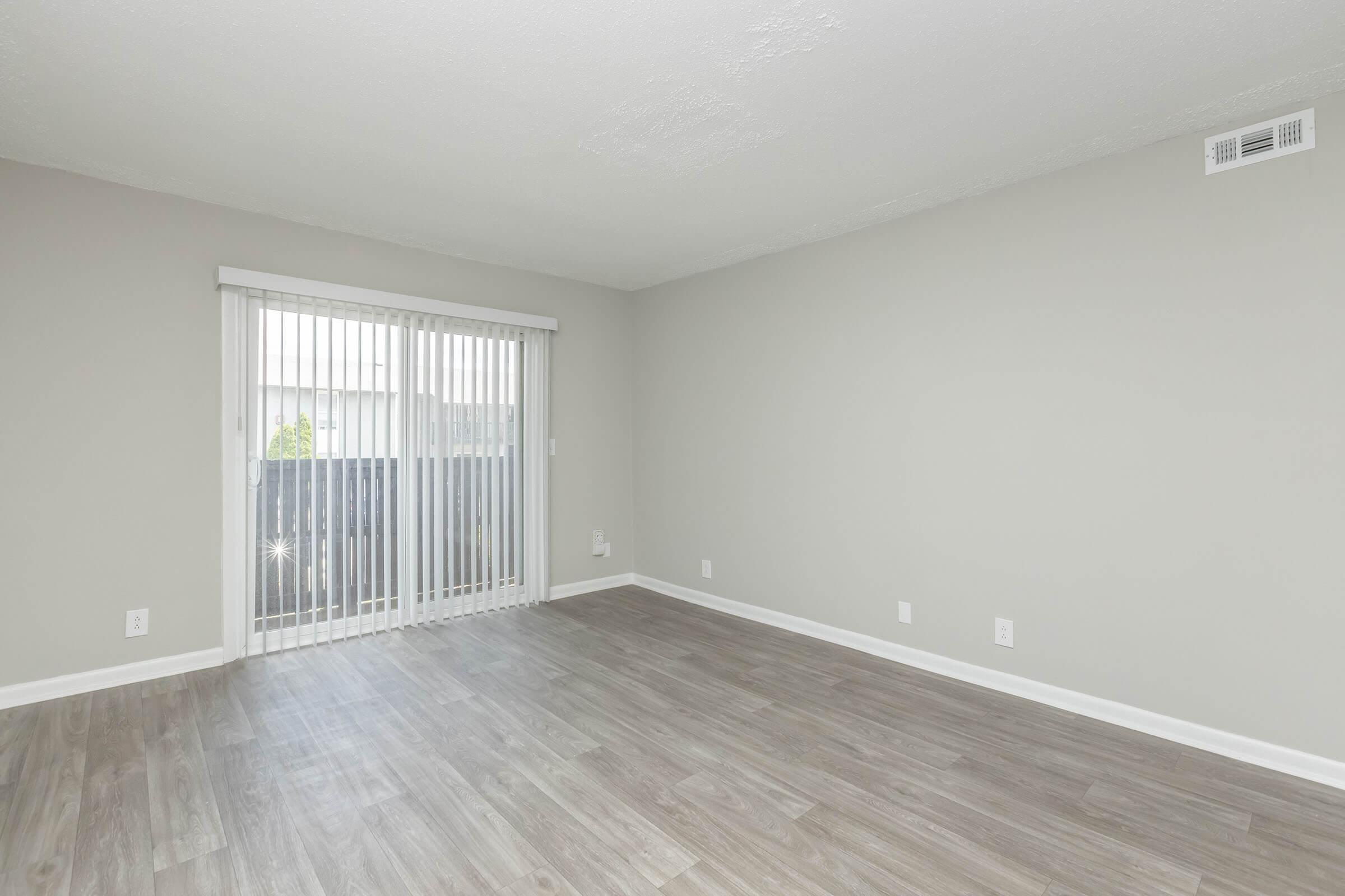 Living Room with Balcony or Patio Doors