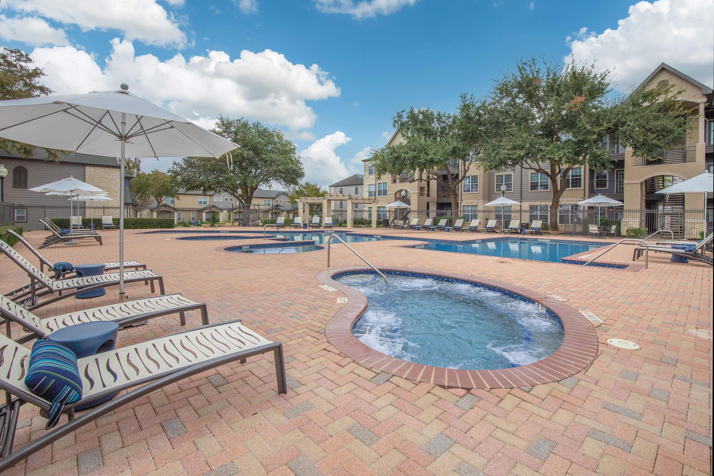 a house with a large pool of water