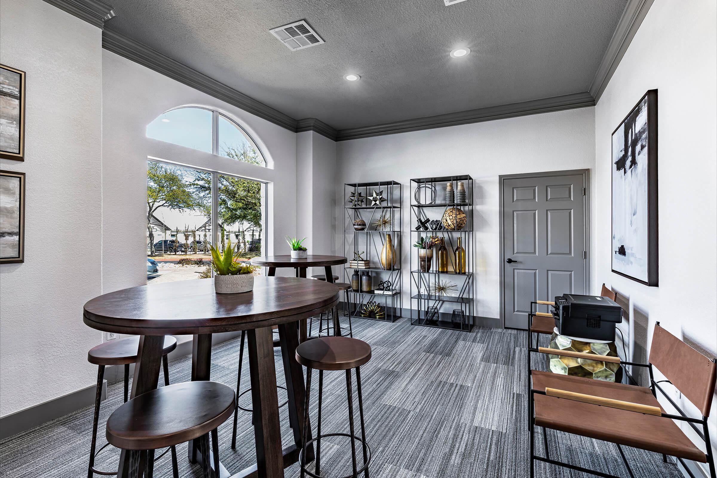 community room with wooden tables and chairs