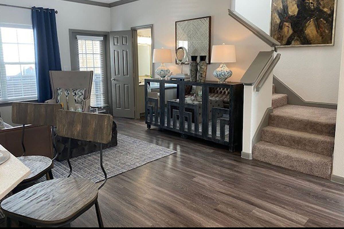 a dining room table in front of a window