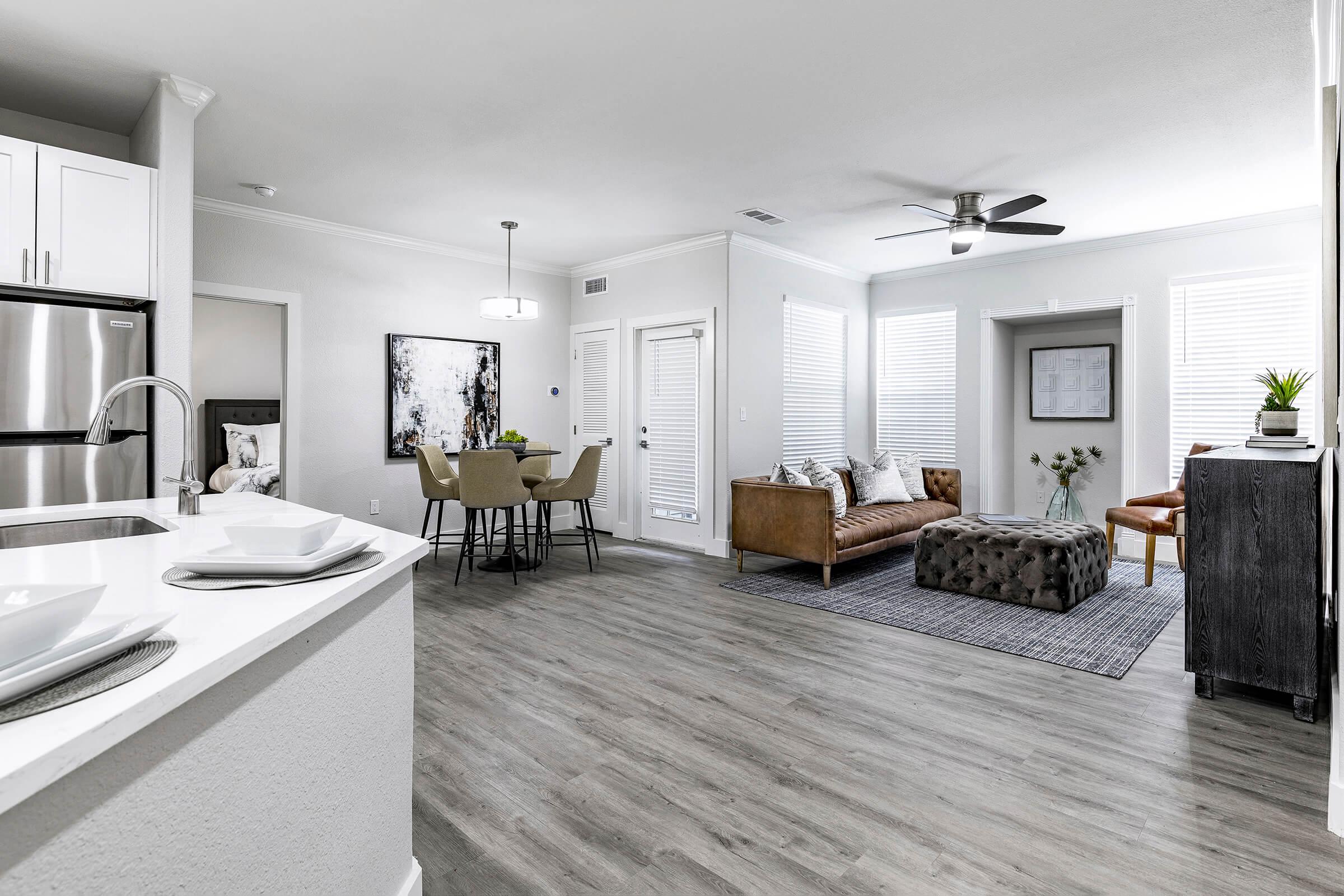 living room and dining room with wooden floors