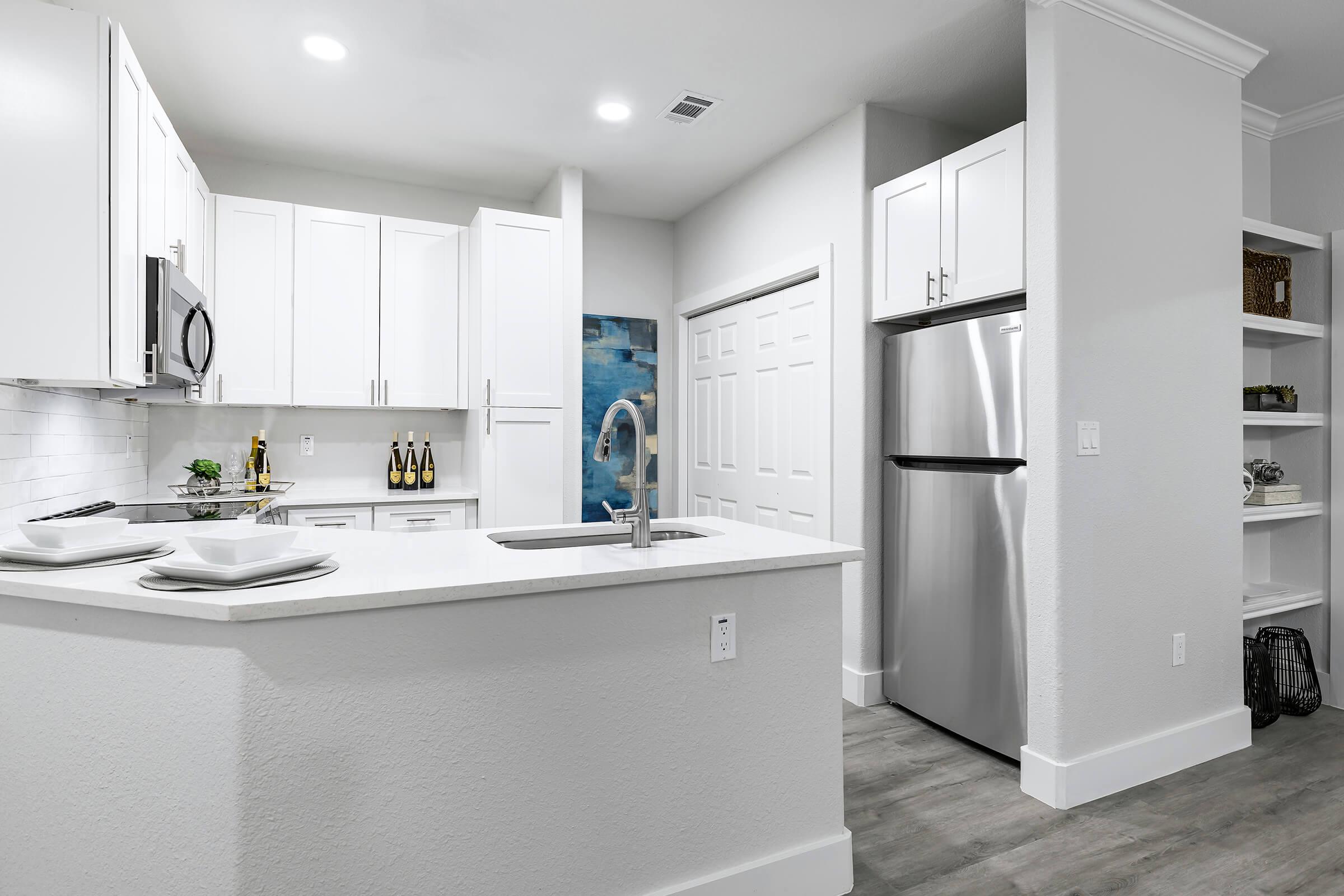 kitchen with white cabinets